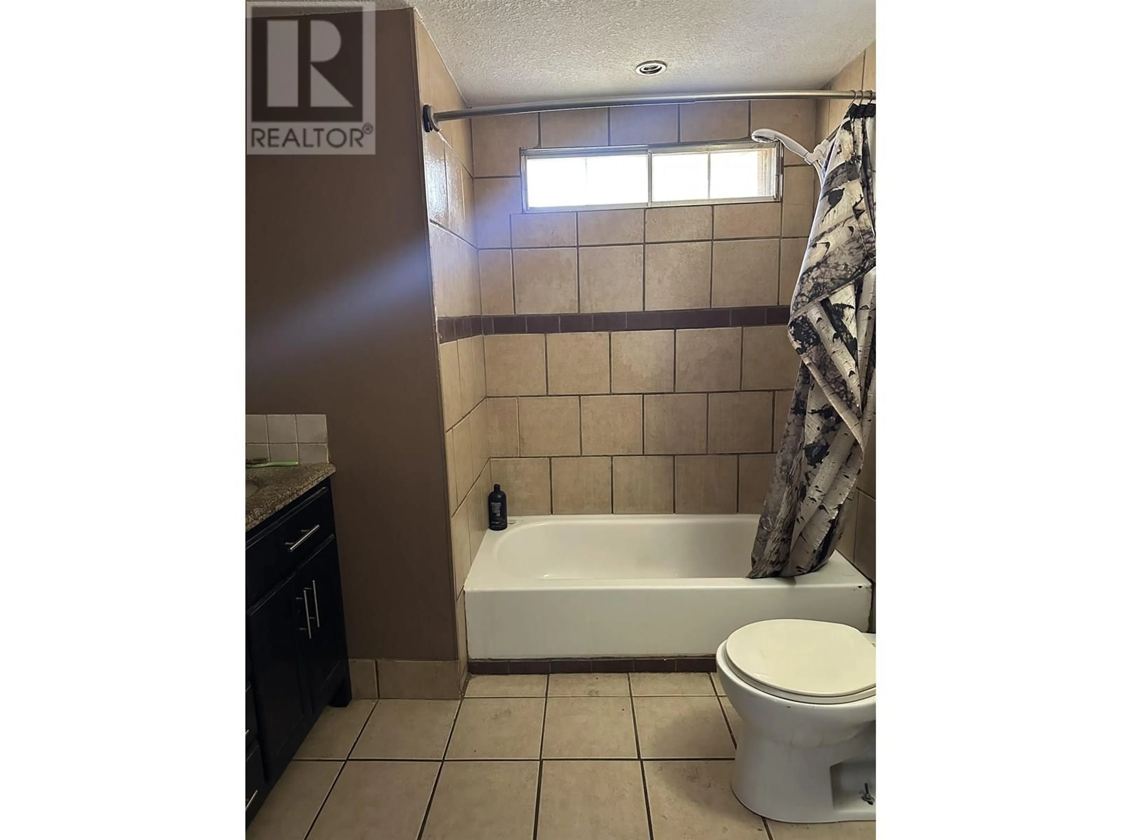 Standard bathroom, ceramic/tile floor for 7183 253 ROAD, Fort St. John British Columbia V0C1C6