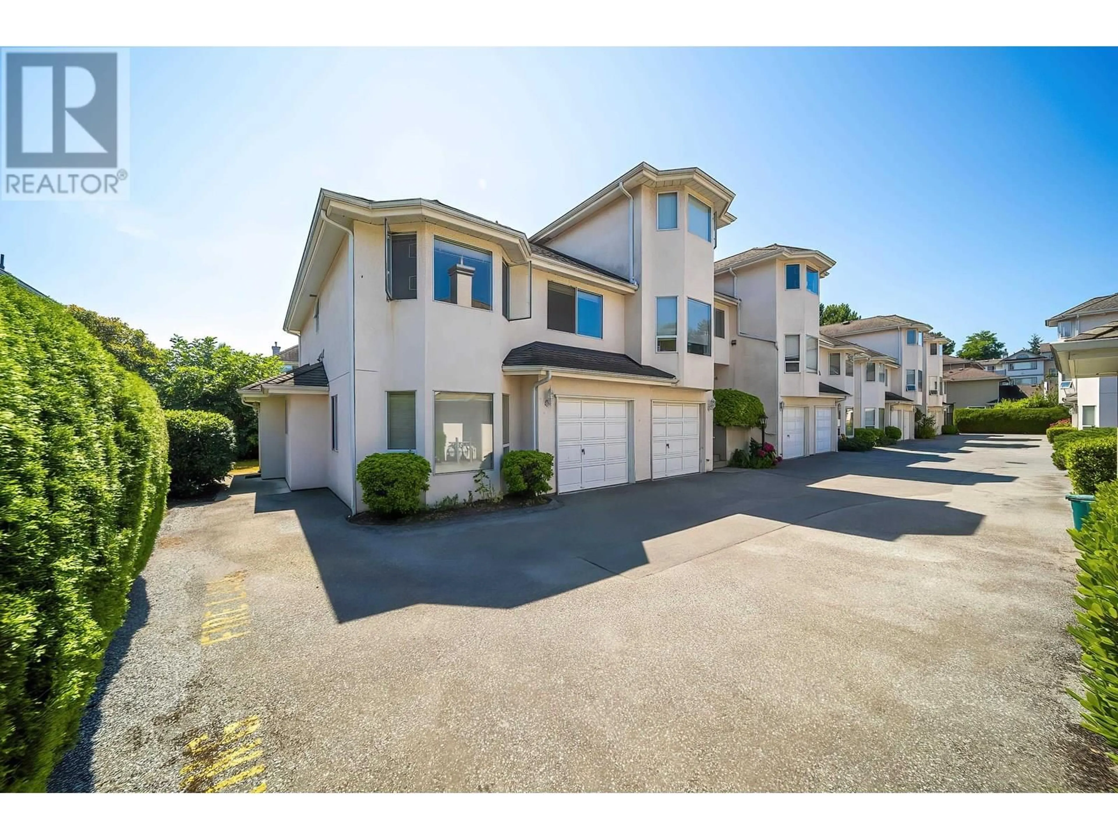 A pic from outside/outdoor area/front of a property/back of a property/a pic from drone, street for 18 - 8220 BENNETT ROAD, Richmond British Columbia V6Y1N5