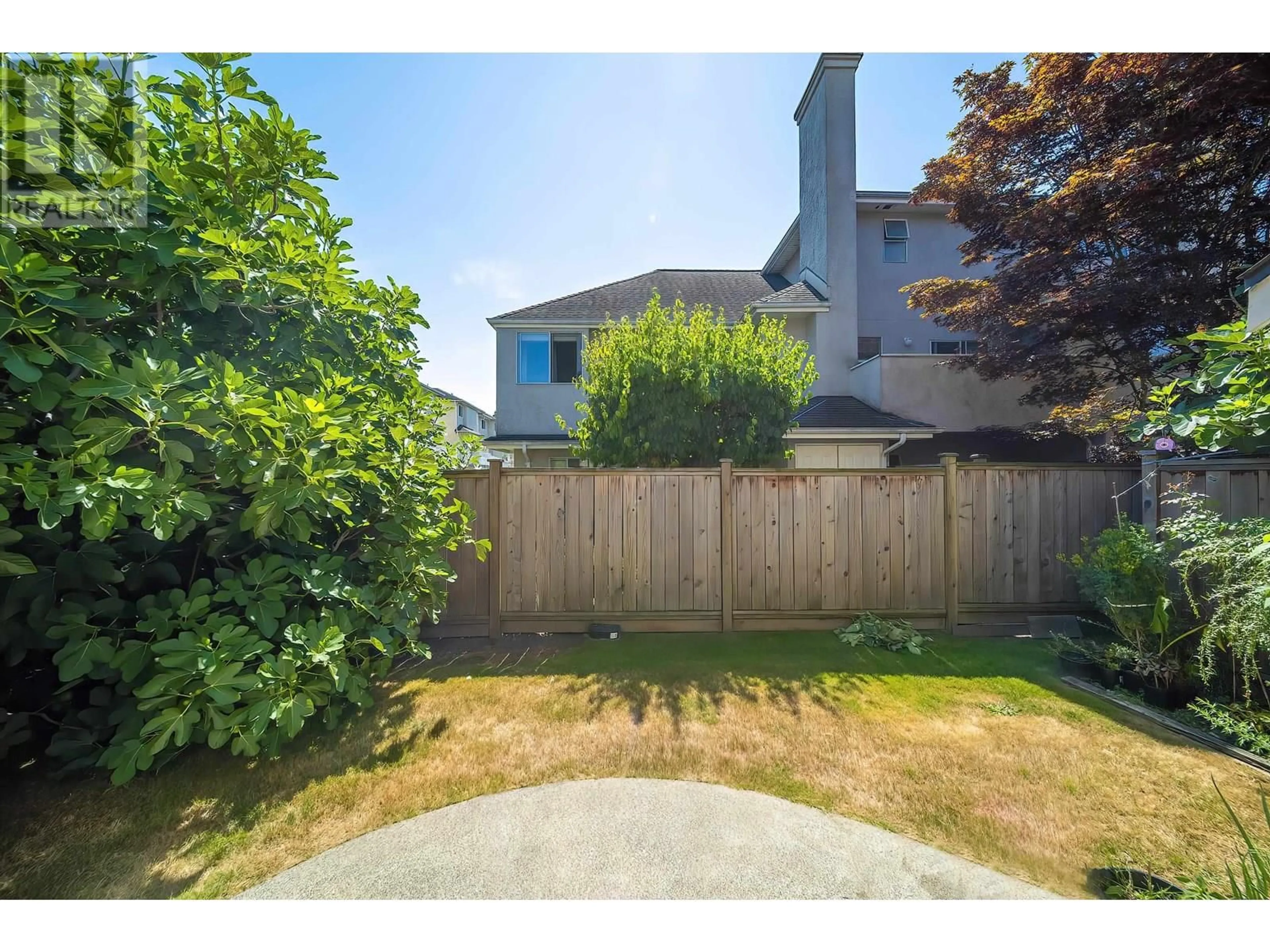 A pic from outside/outdoor area/front of a property/back of a property/a pic from drone, street for 18 - 8220 BENNETT ROAD, Richmond British Columbia V6Y1N5