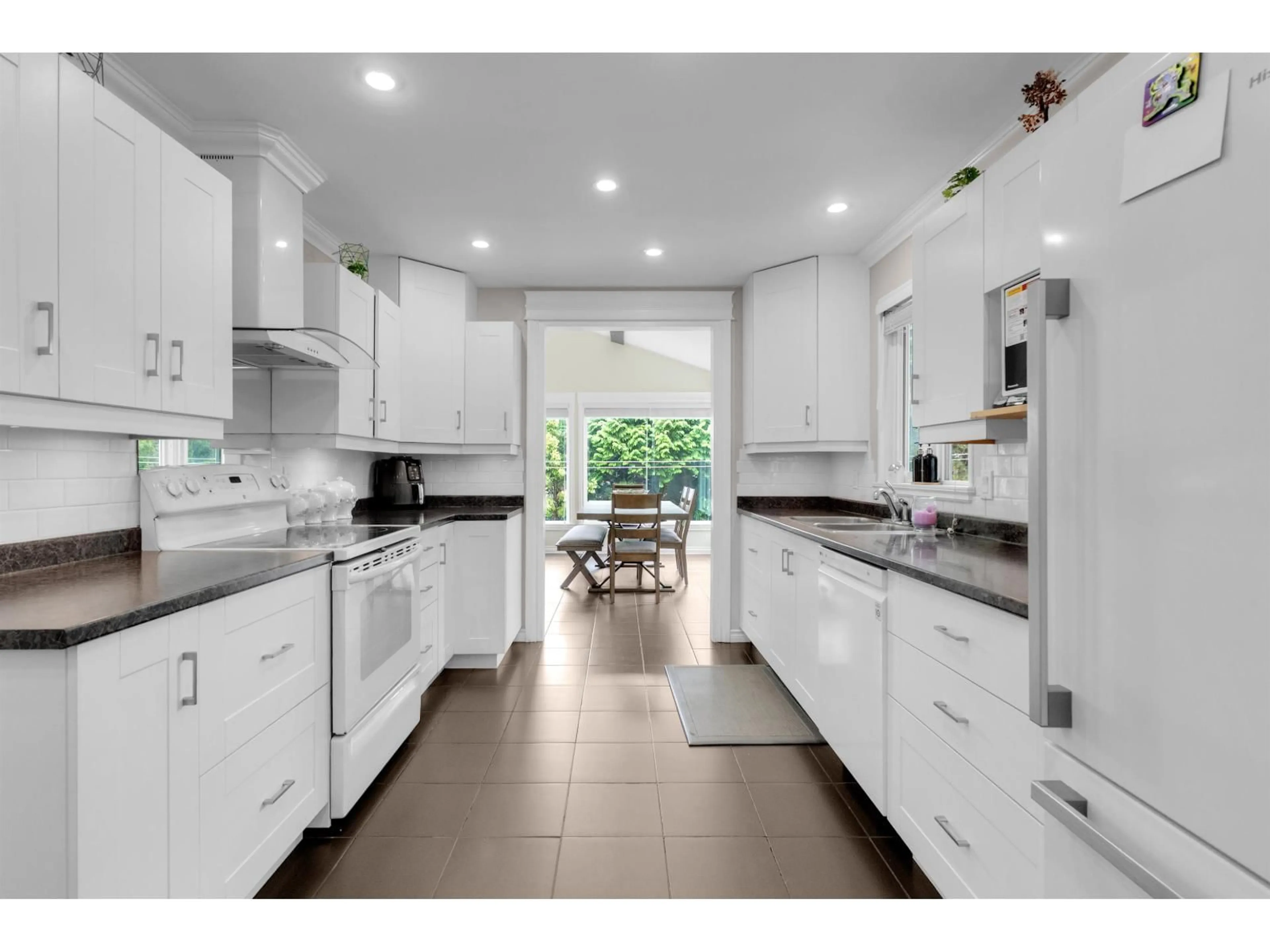 Open concept kitchen, ceramic/tile floor for 17460 61B, Surrey British Columbia V3S5K6