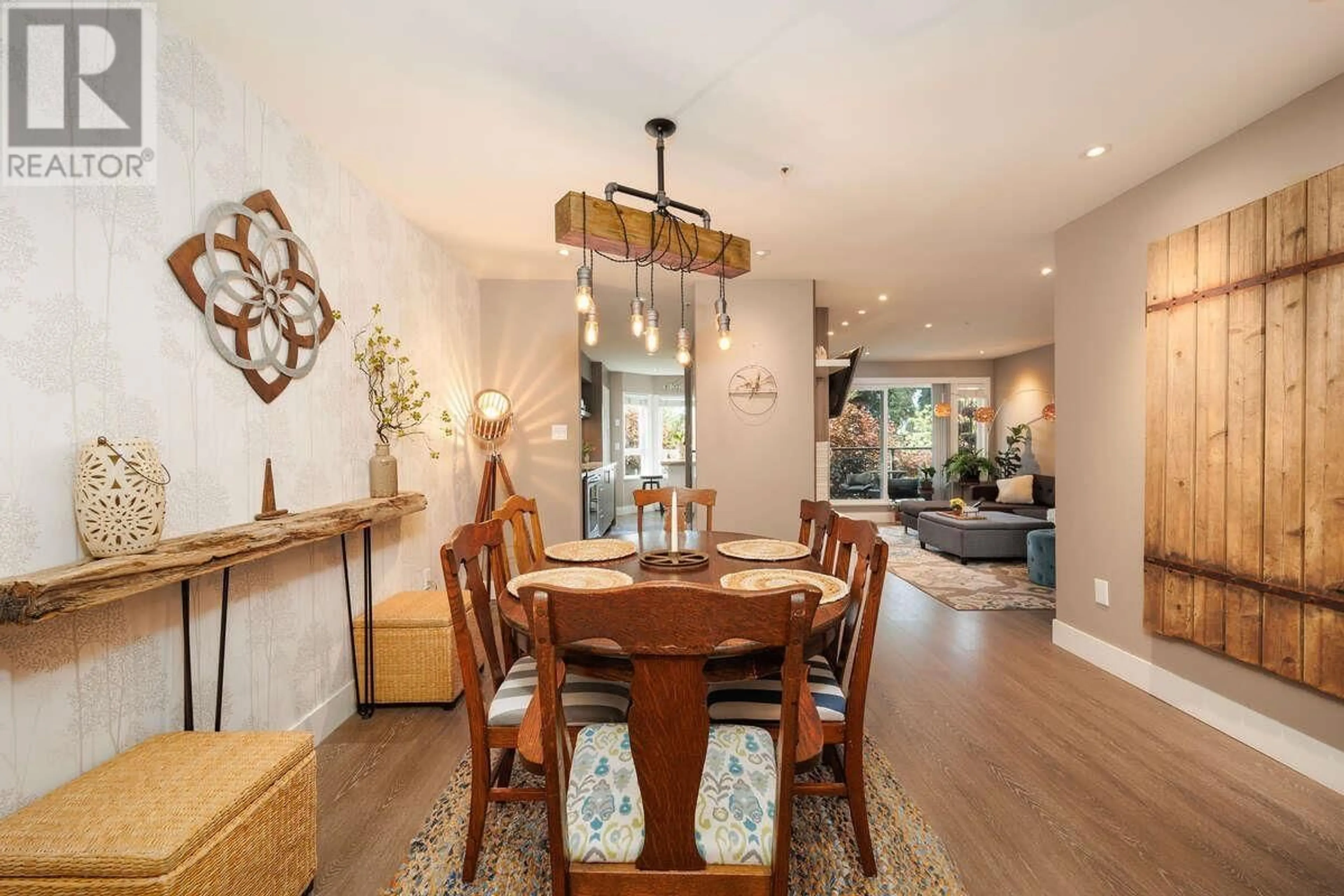 Dining room, wood/laminate floor for 202 - 2250 MARINE DRIVE, Vancouver British Columbia V5P2S2
