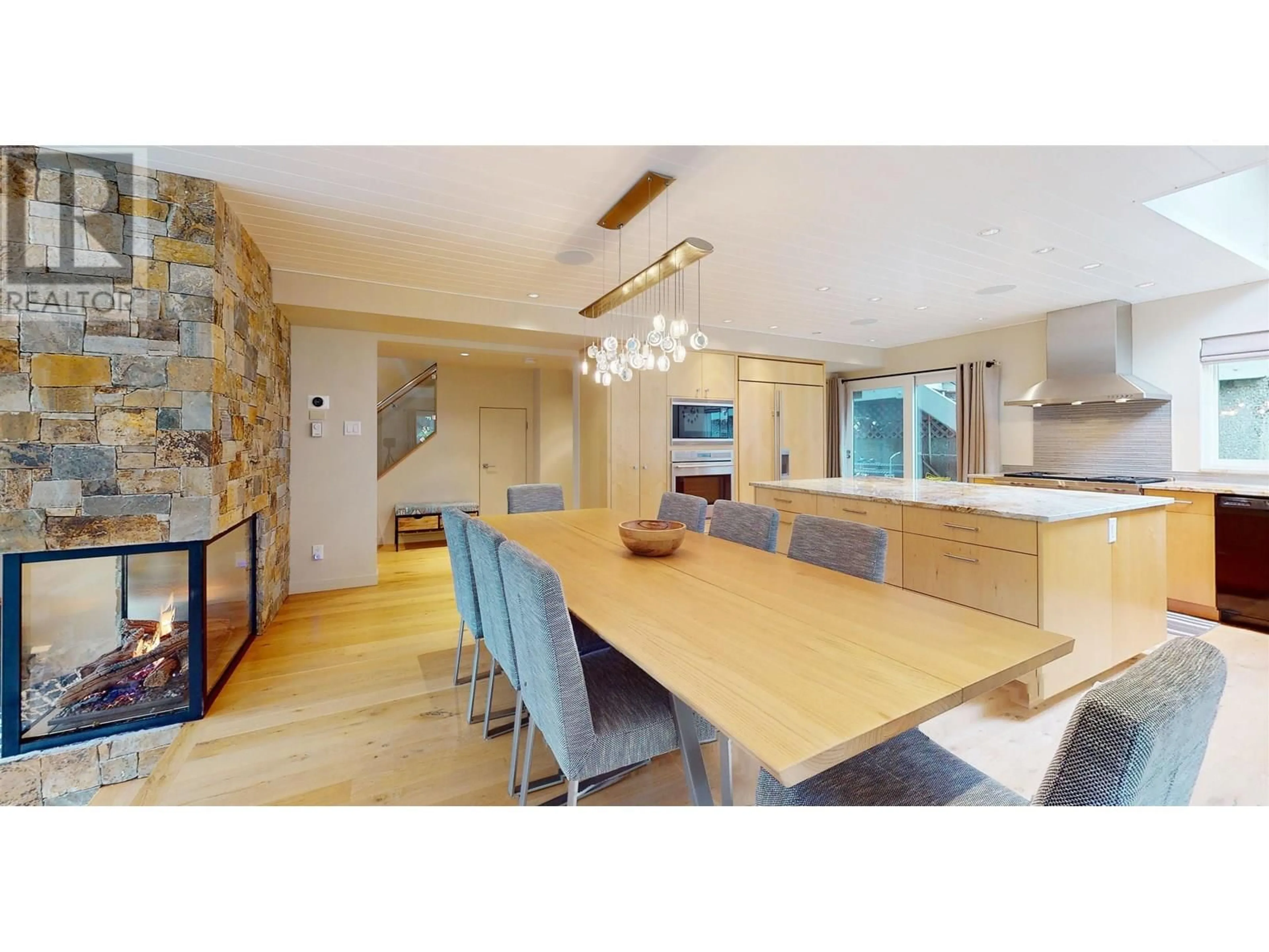 Open concept kitchen, wood/laminate floor for 7410 AMBASSADOR CRESCENT, Whistler British Columbia V8E0E4