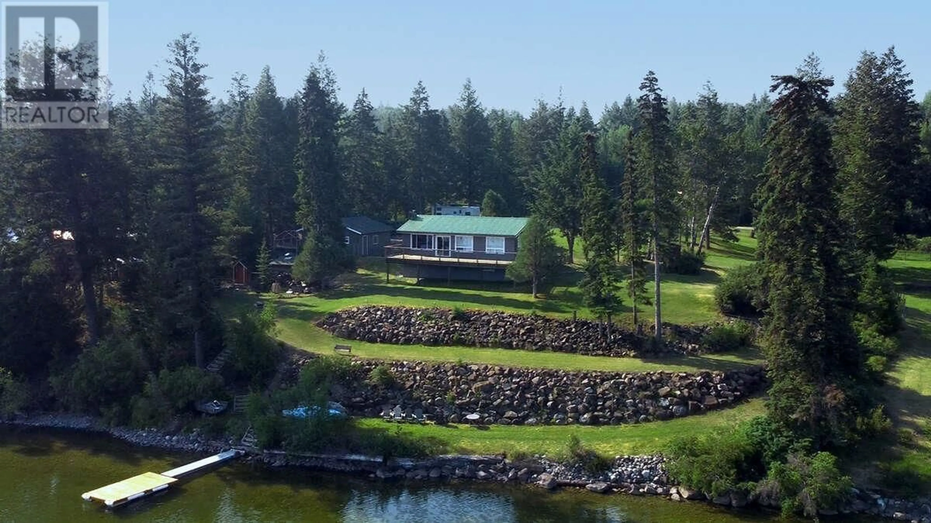 A pic from outside/outdoor area/front of a property/back of a property/a pic from drone, water/lake/river/ocean view for 4803 LAKEVIEW ROAD, Lac La Hache British Columbia V0K1T0