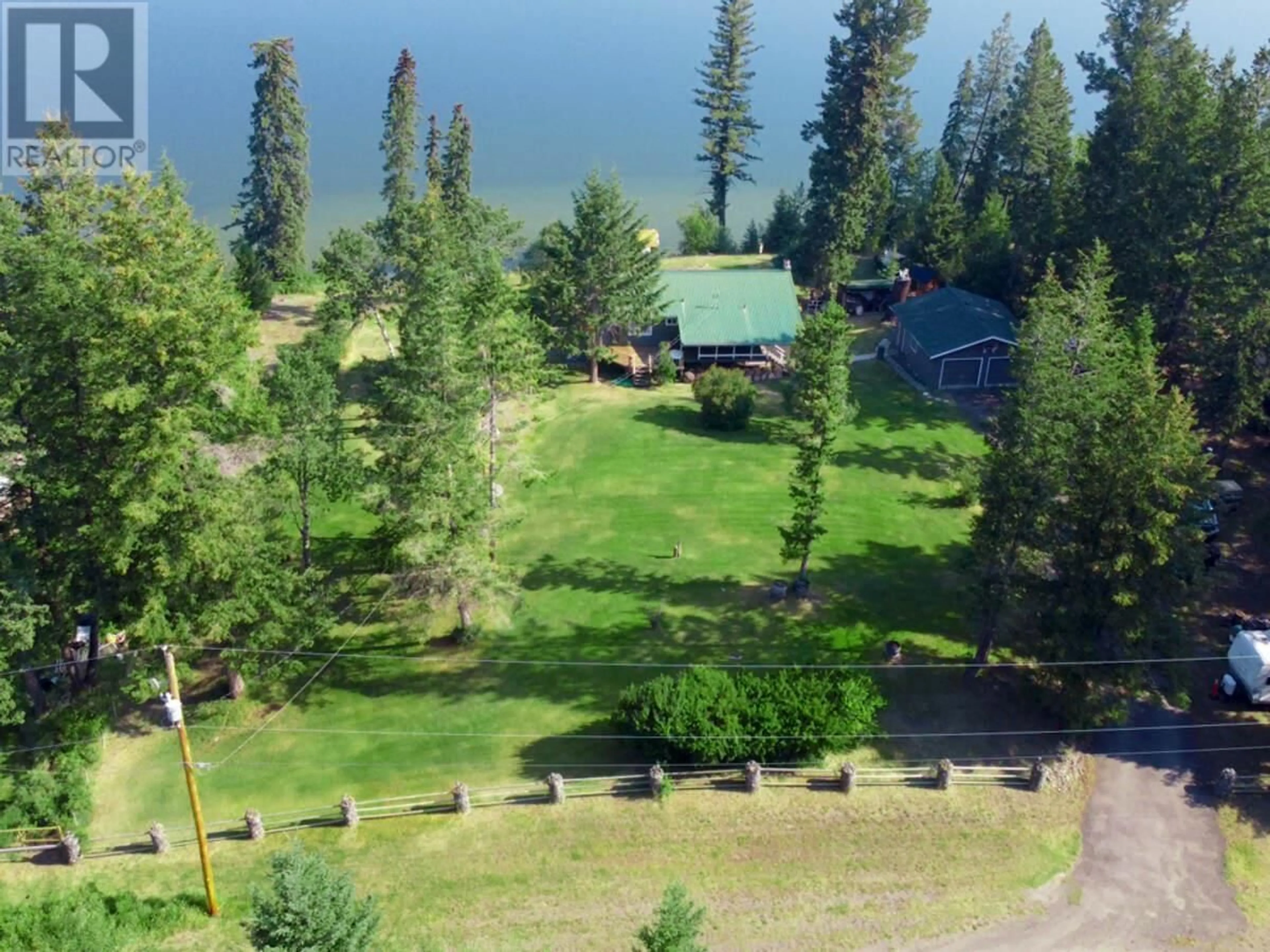 A pic from outside/outdoor area/front of a property/back of a property/a pic from drone, water/lake/river/ocean view for 4803 LAKEVIEW ROAD, Lac La Hache British Columbia V0K1T0