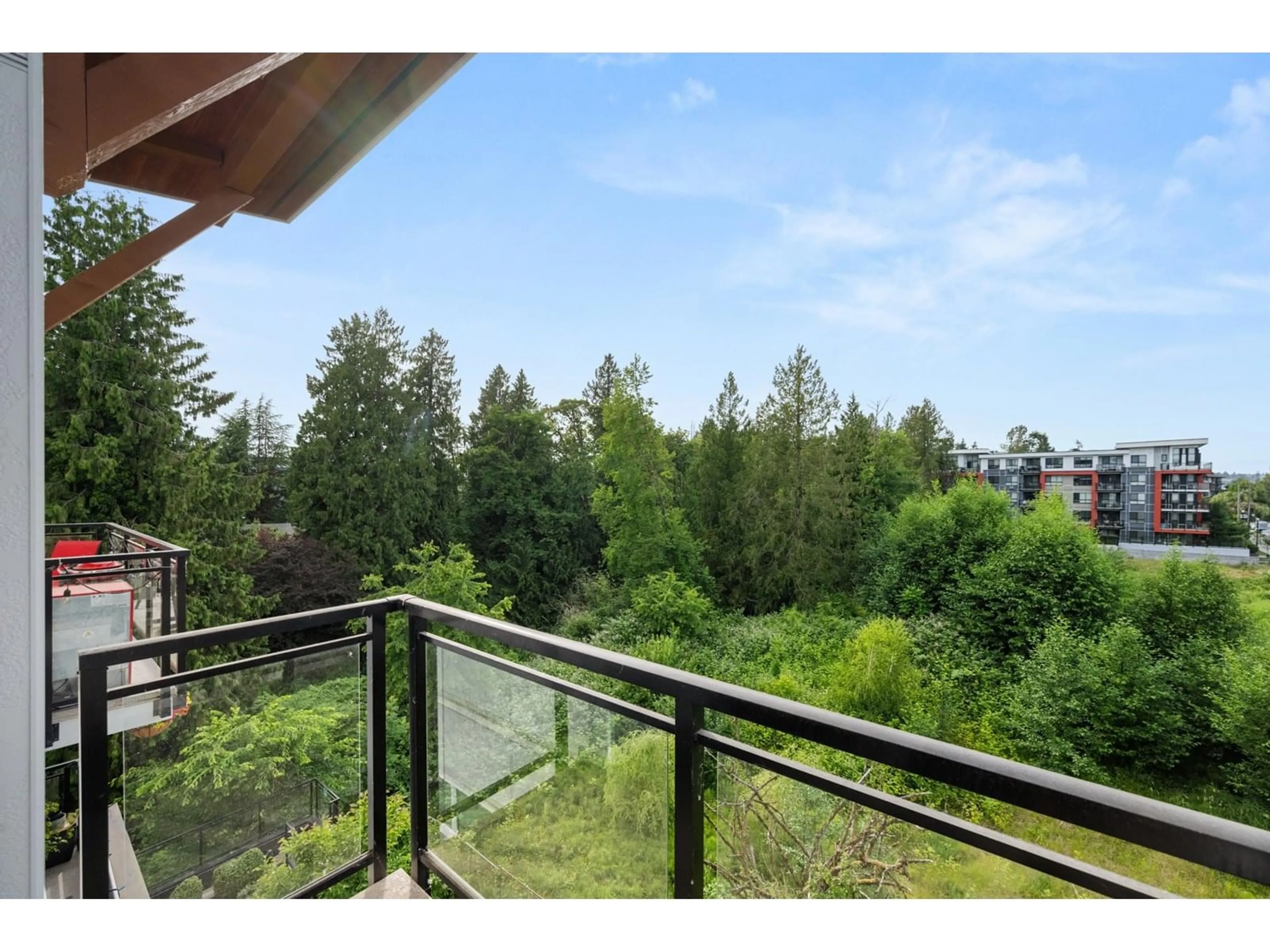 Balcony in the apartment, forest/trees view for 424 - 5415 BRYDON, Langley British Columbia V3A0N4