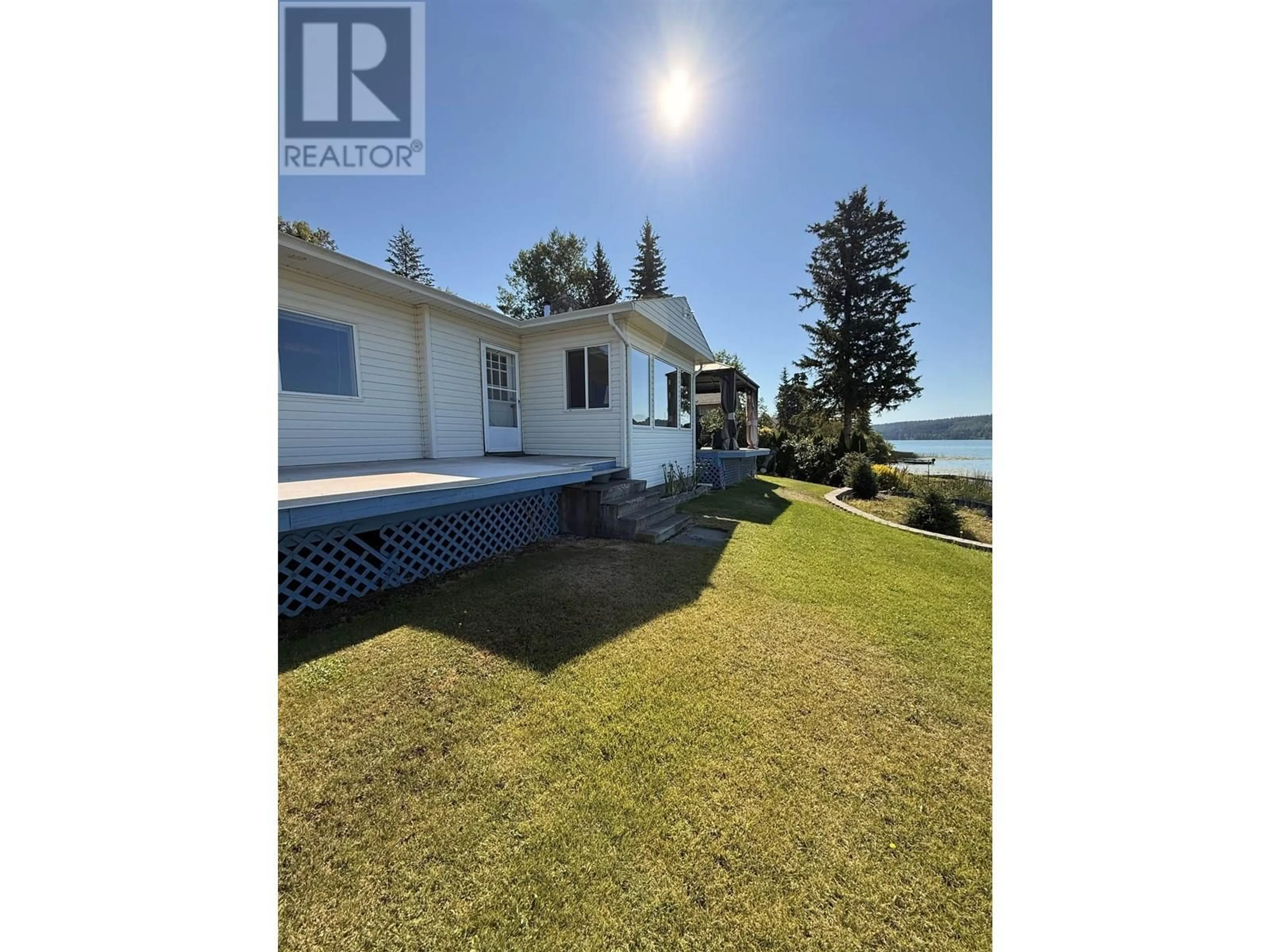 A pic from outside/outdoor area/front of a property/back of a property/a pic from drone, water/lake/river/ocean view for 3456 DUNSMUIR ROAD, Lac La Hache British Columbia V0K1T1