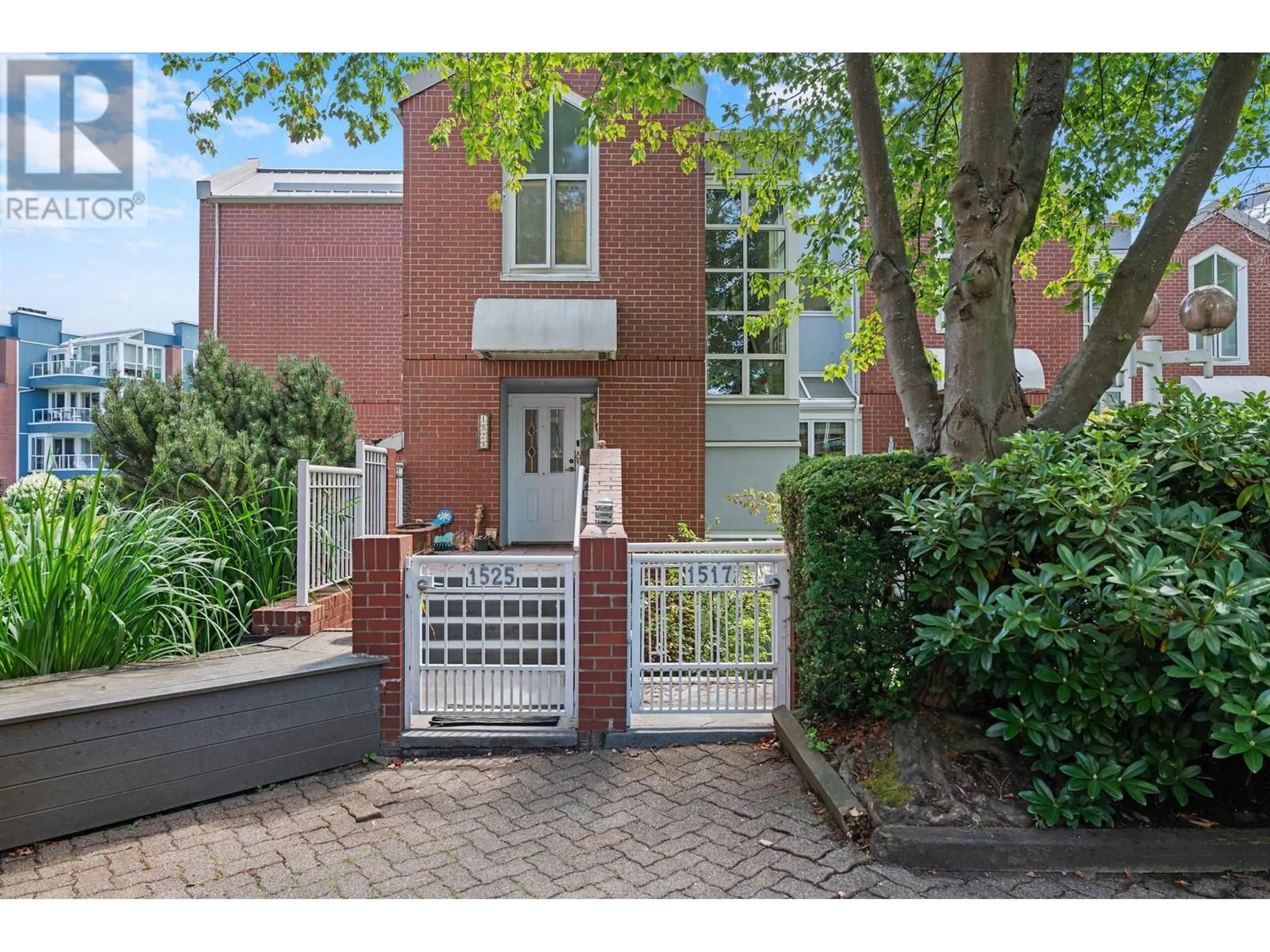 Home with brick exterior material, street for 1525 MARINER WALK, Vancouver British Columbia V6J5A6