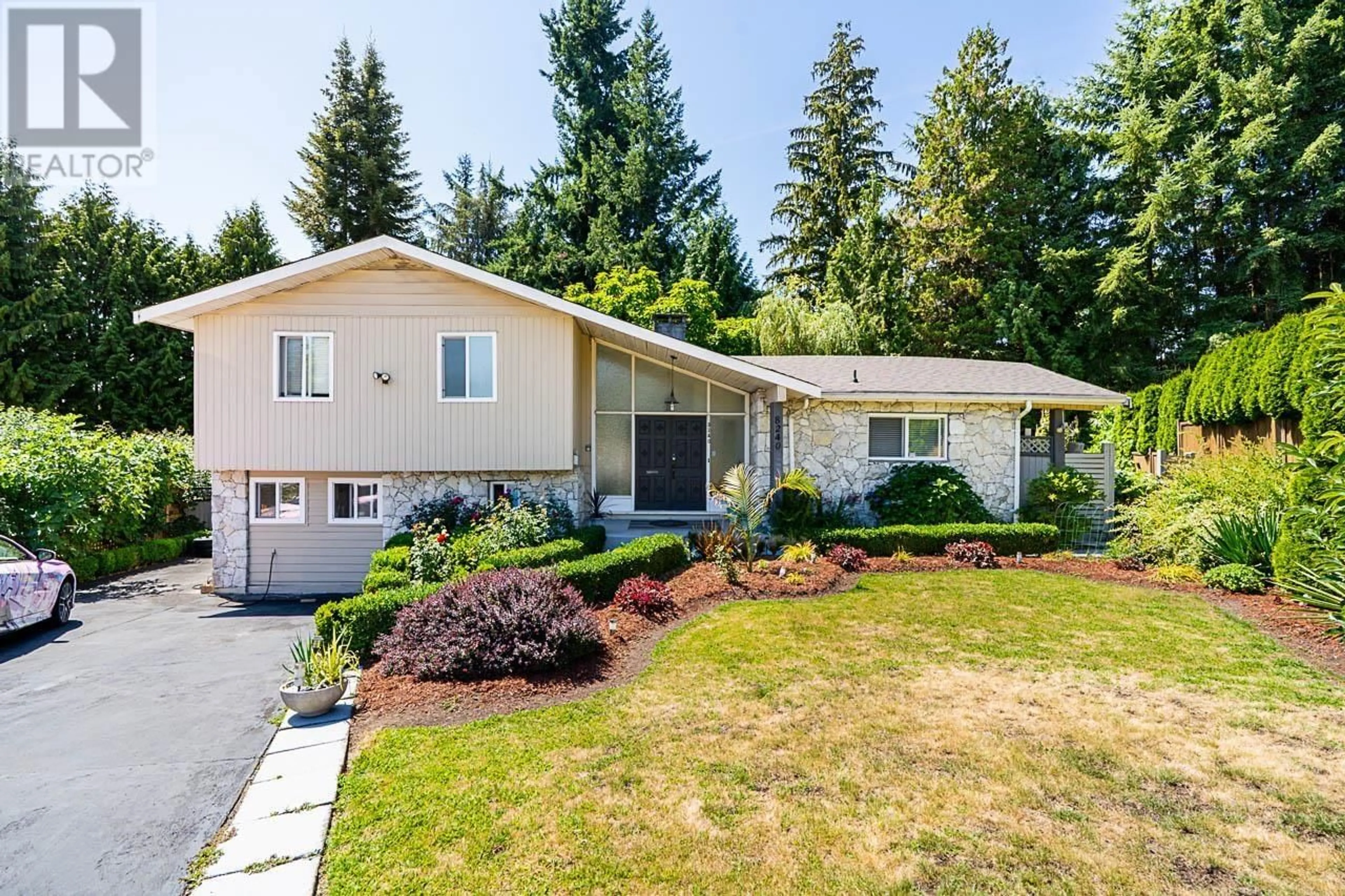 Home with vinyl exterior material, street for 8240 MANSON DRIVE, Burnaby British Columbia V5A2C2