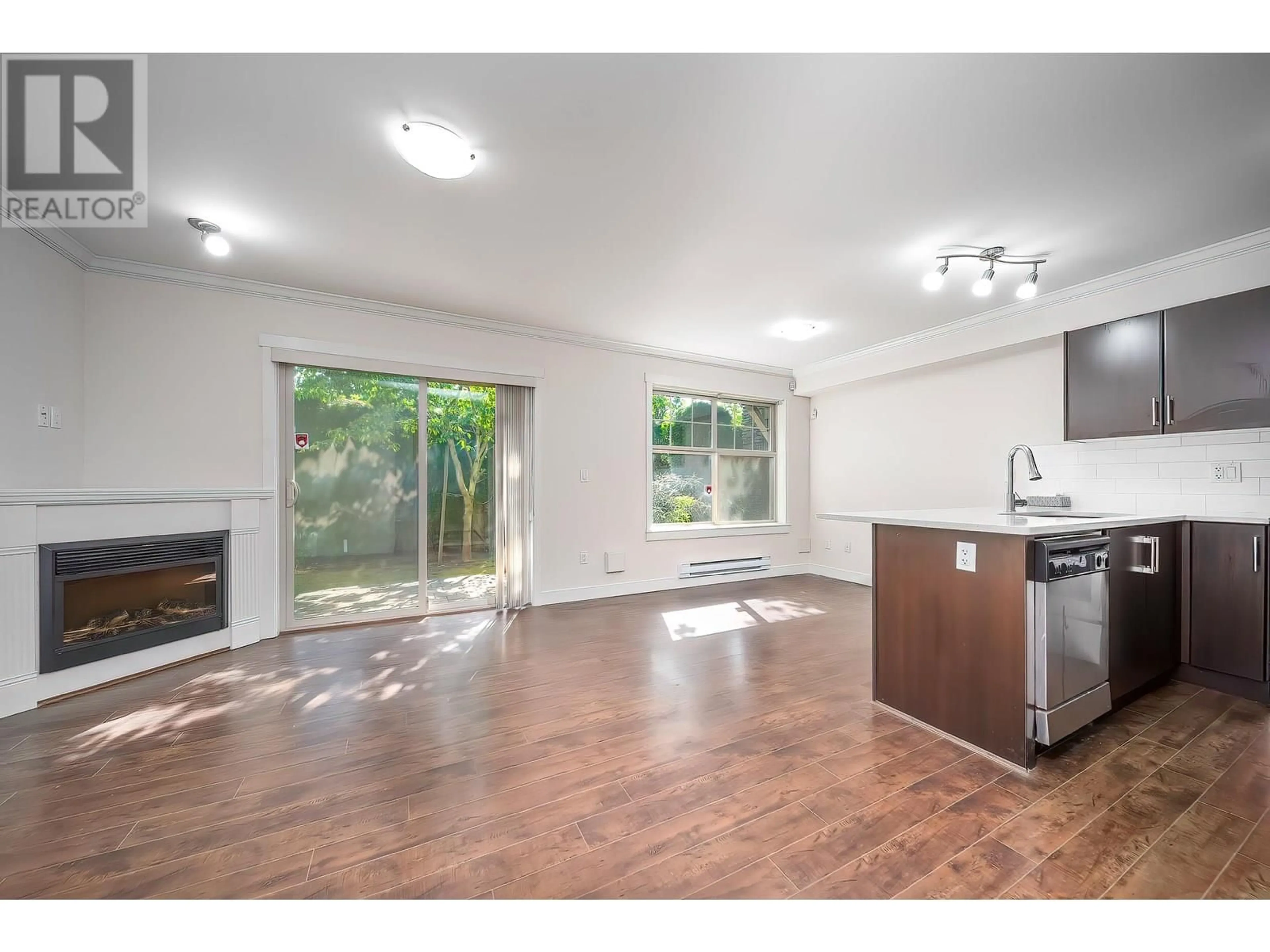 Open concept kitchen, wood/laminate floor for 9 - 11111 CAMBIE ROAD, Richmond British Columbia V6X1L3