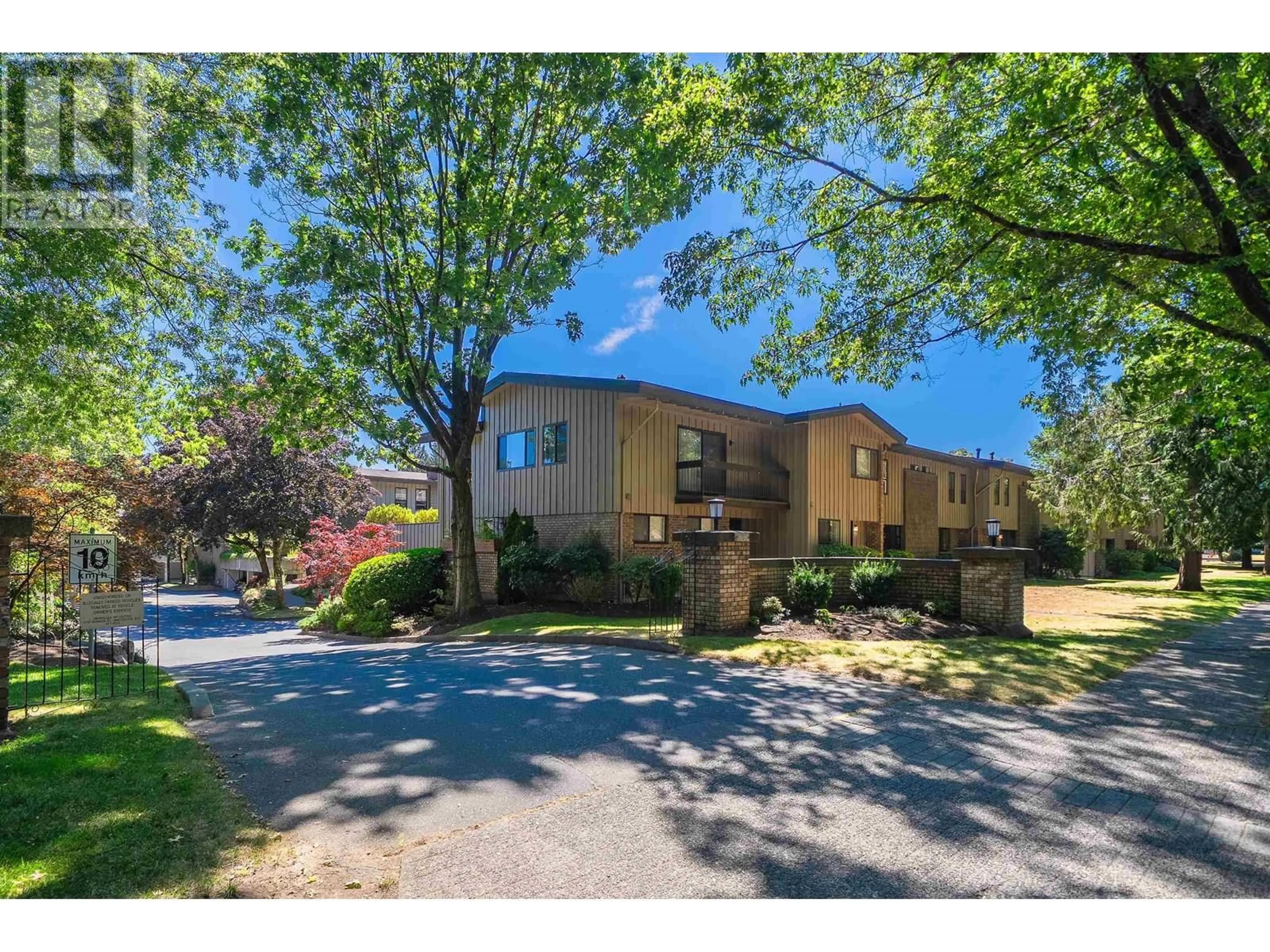A pic from outside/outdoor area/front of a property/back of a property/a pic from drone, street for 34 - 3150 58TH AVENUE, Vancouver British Columbia V5S3S9