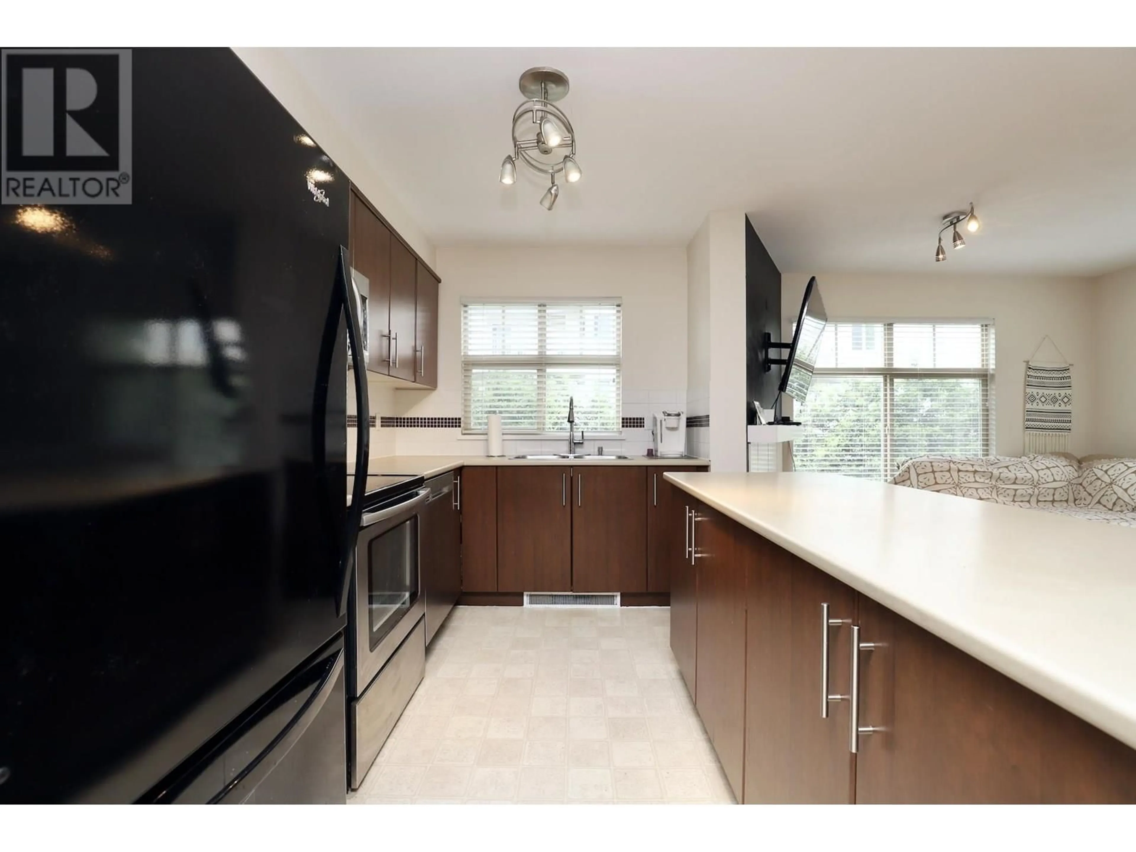 Open concept kitchen, unknown for 317 - 12238 224 STREET, Maple Ridge British Columbia V2X8W5