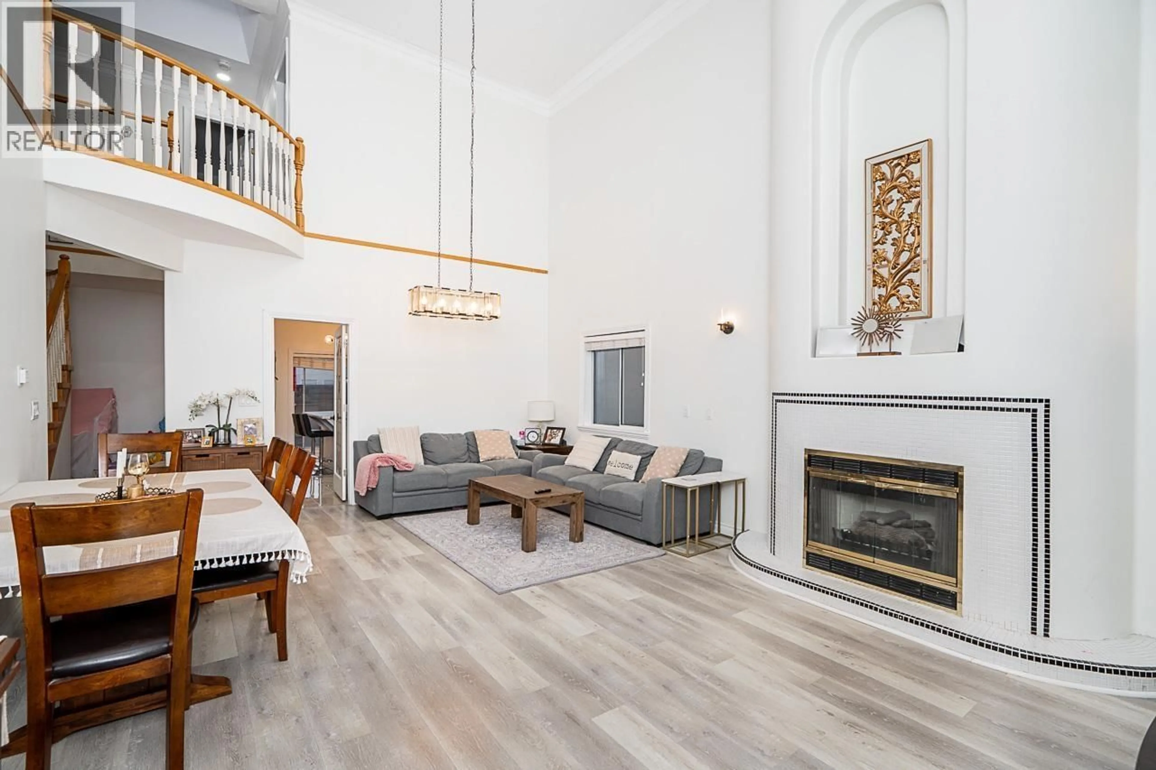 Living room with furniture, wood/laminate floor for 5251 BROCK STREET, Richmond British Columbia V6V2R1