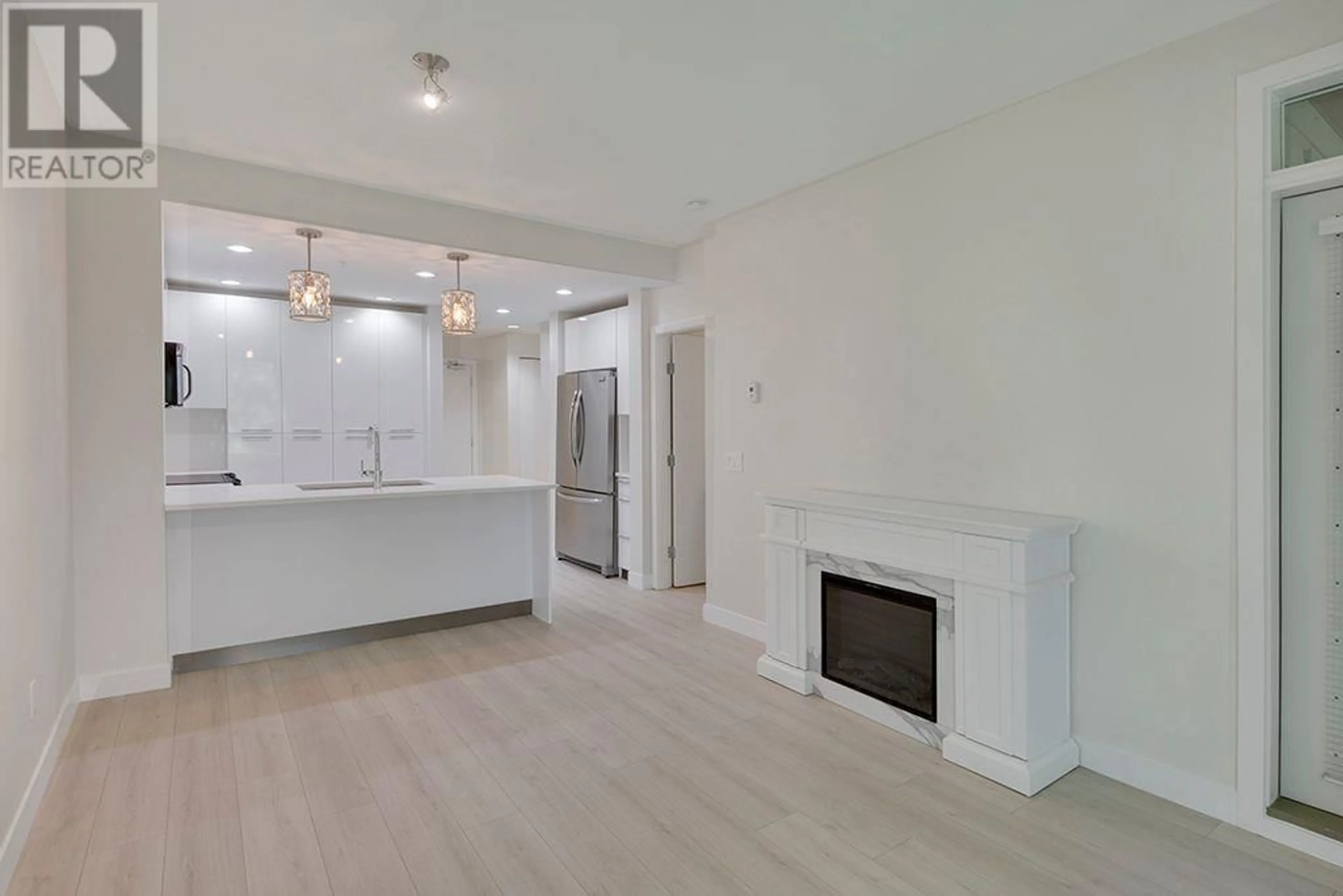 Open concept kitchen, unknown for 404 - 733 3RD STREET, North Vancouver British Columbia V7M0C8