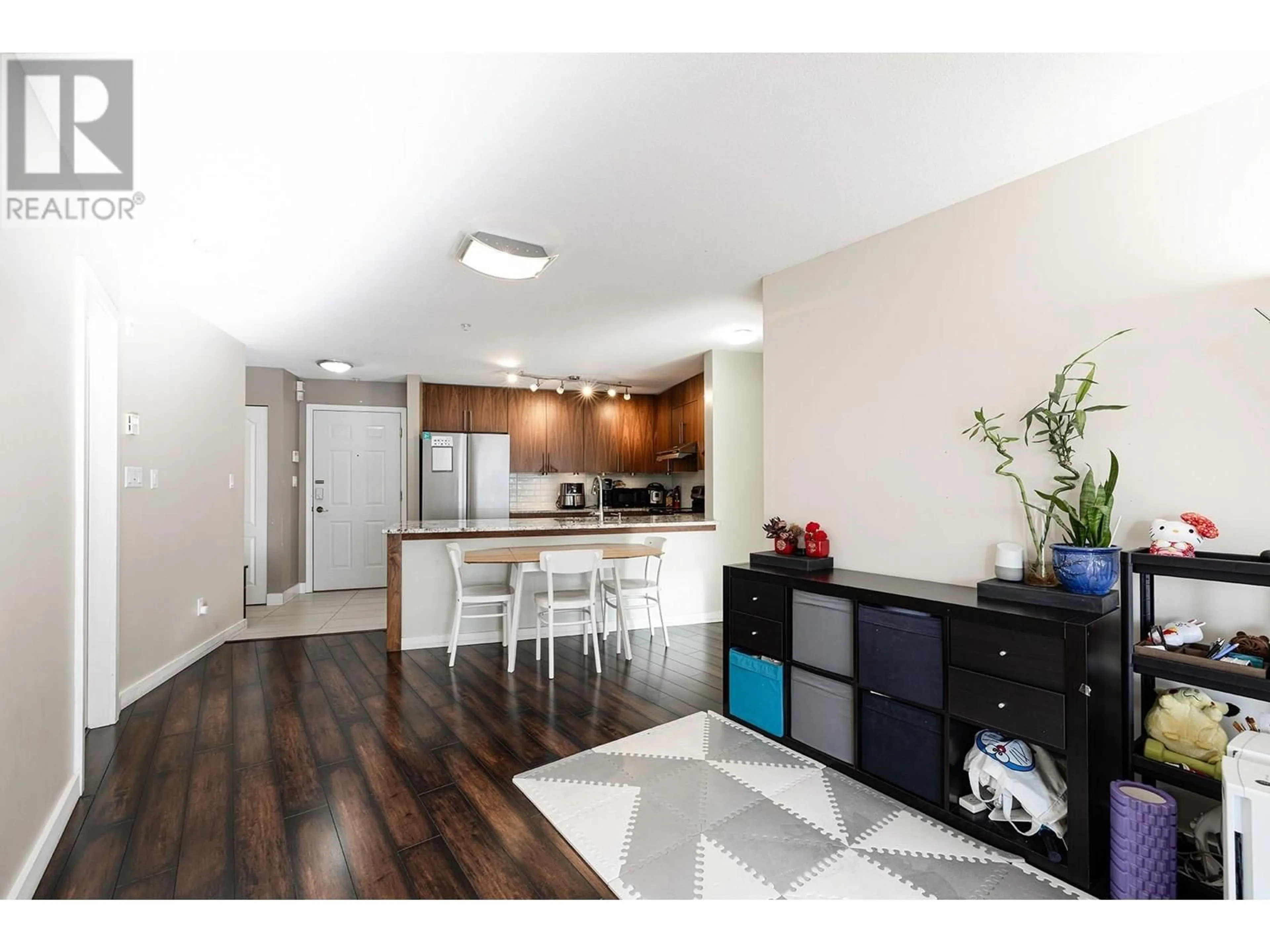 Open concept kitchen, wood/laminate floor for 219 - 5880 DOVER CRESCENT, Richmond British Columbia V7C5P5
