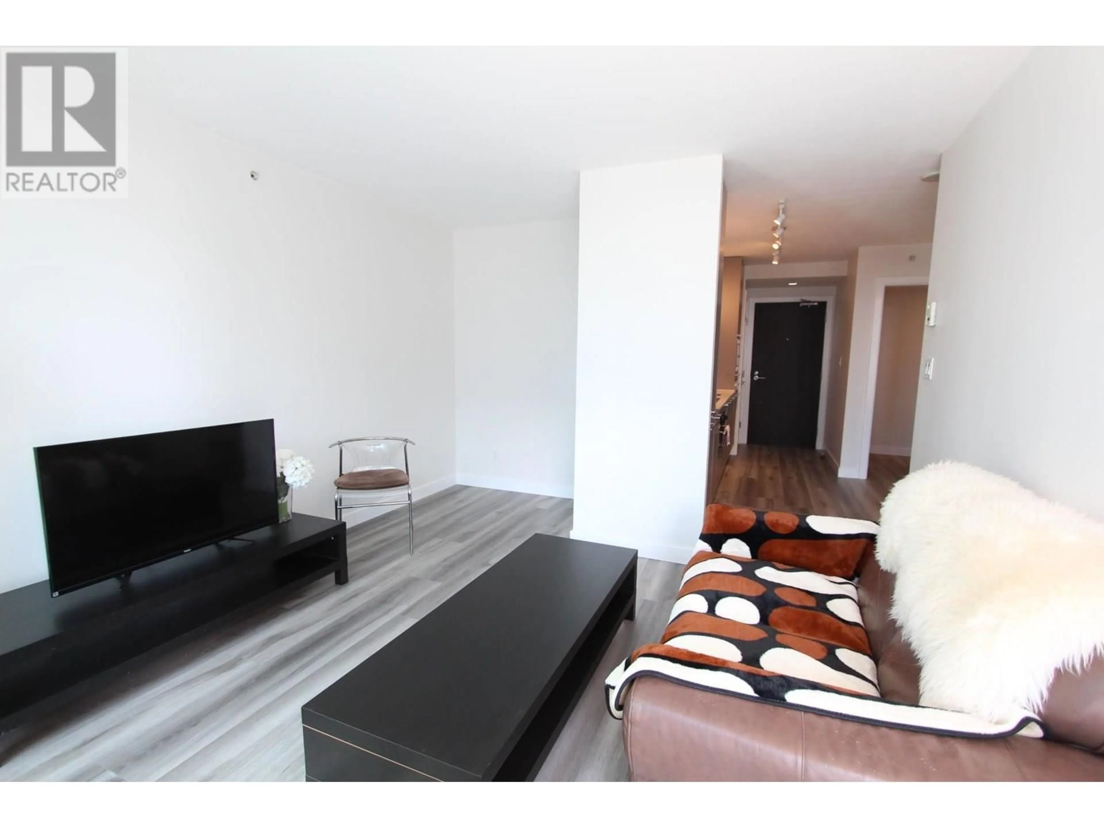 Living room with furniture, unknown for 1107 - 8031 NUNAVUT LANE, Vancouver British Columbia V5X0C9