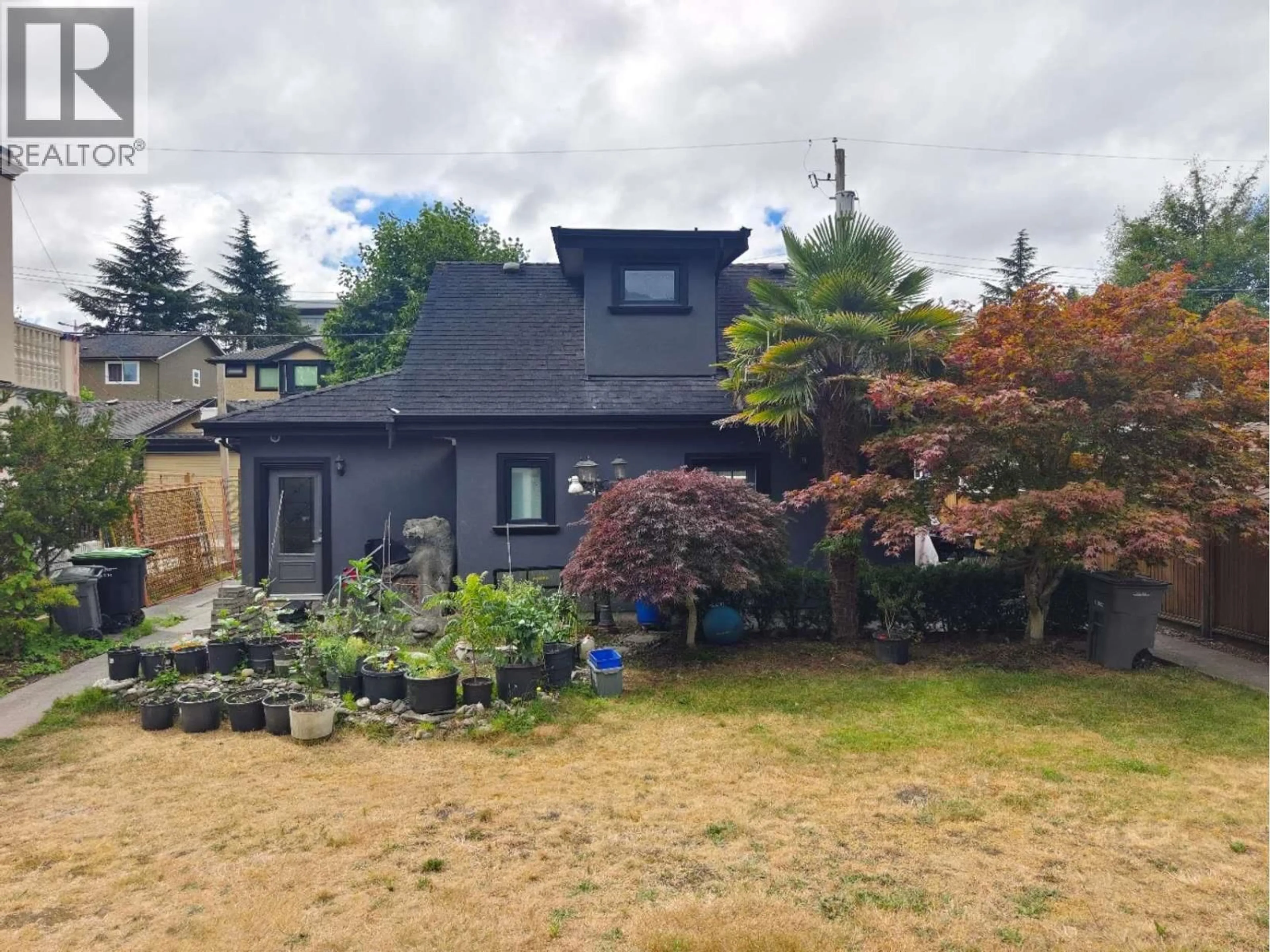 A pic from outside/outdoor area/front of a property/back of a property/a pic from drone, street for 938 32ND AVENUE, Vancouver British Columbia V5Z2K2