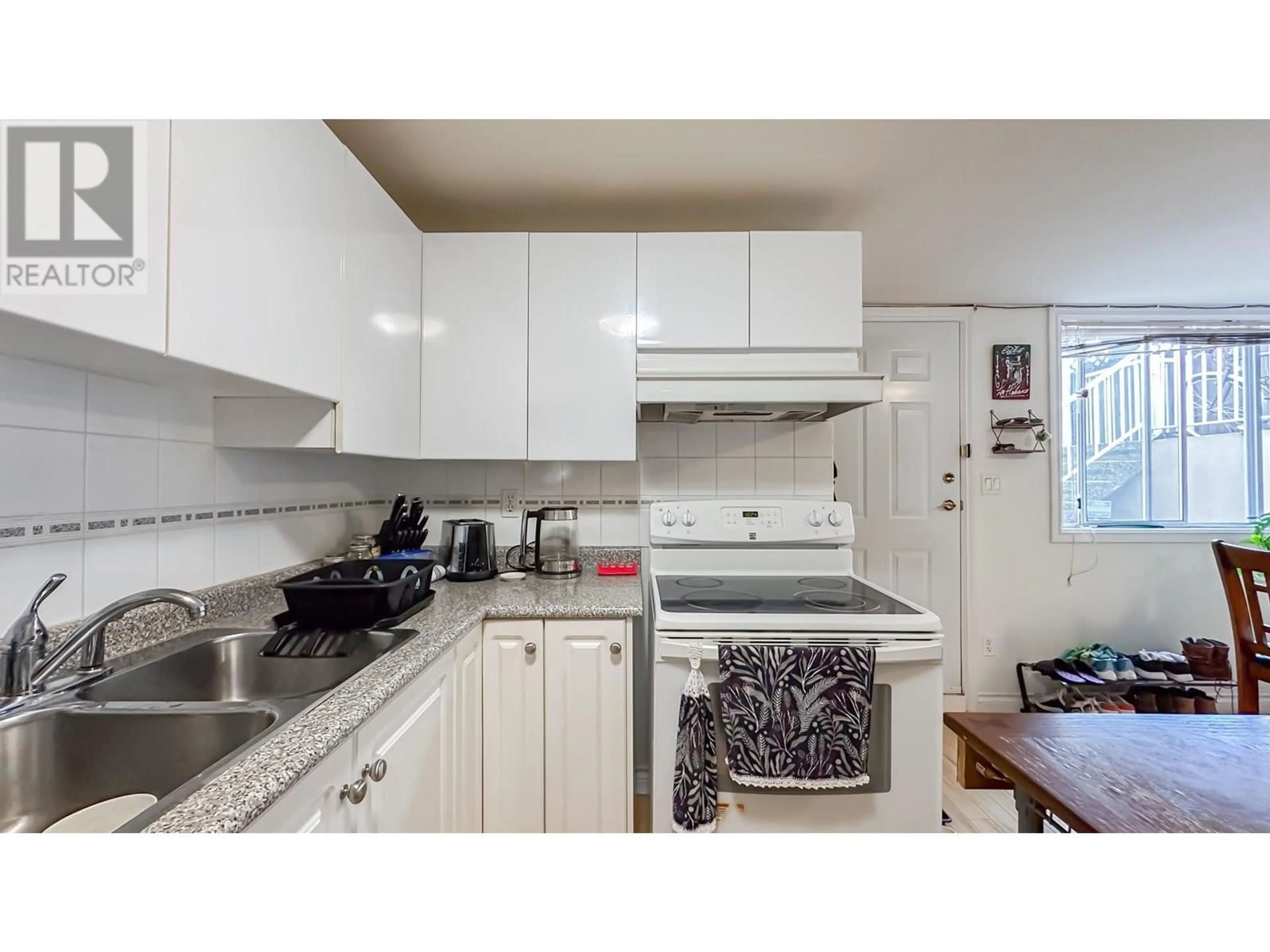 Standard kitchen, wood/laminate floor for 2137 20TH AVENUE, Vancouver British Columbia V6L1E9