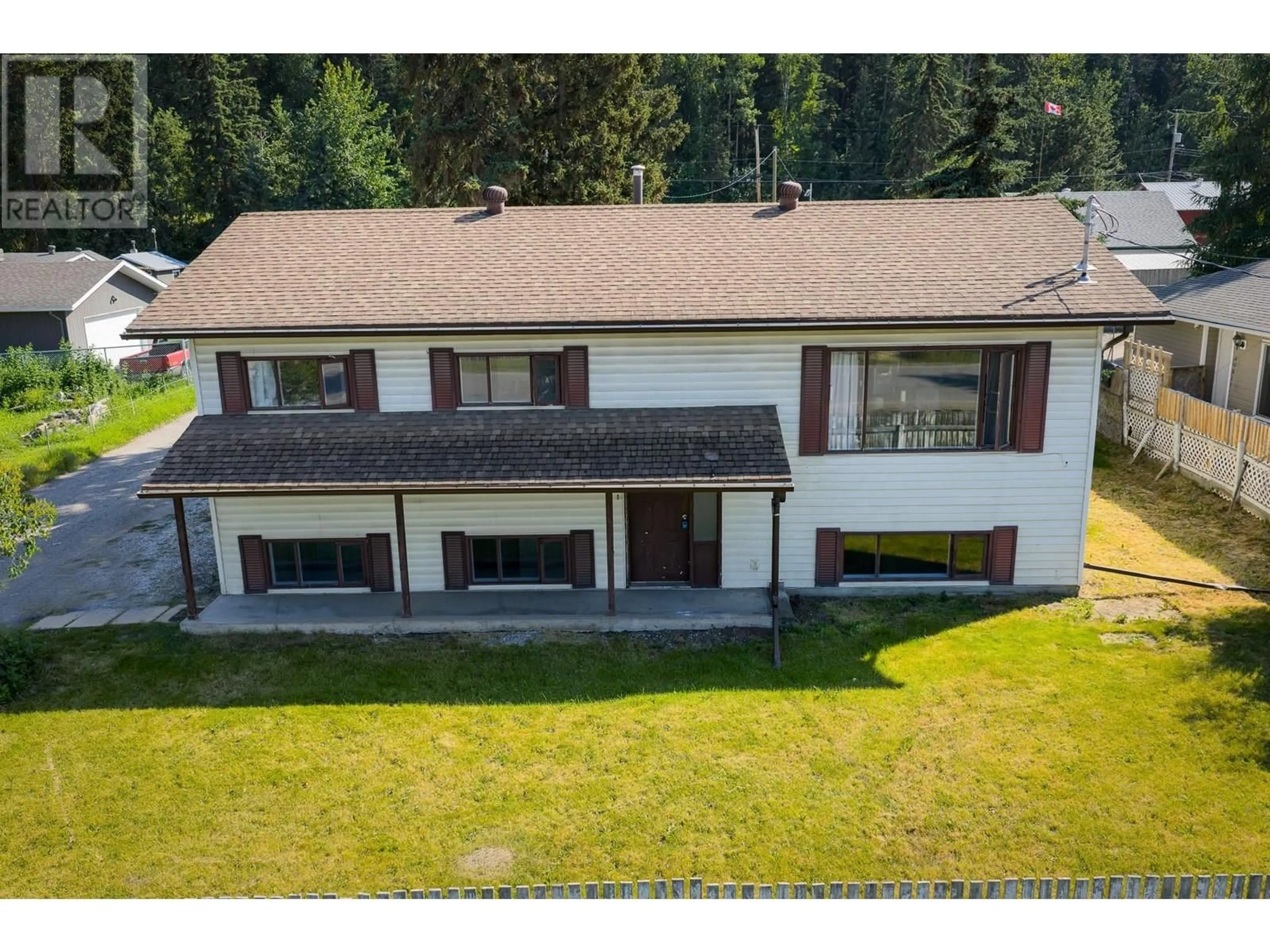 A pic from outside/outdoor area/front of a property/back of a property/a pic from drone, unknown for 218 3RD STREET, Vanderhoof British Columbia V0J3A0