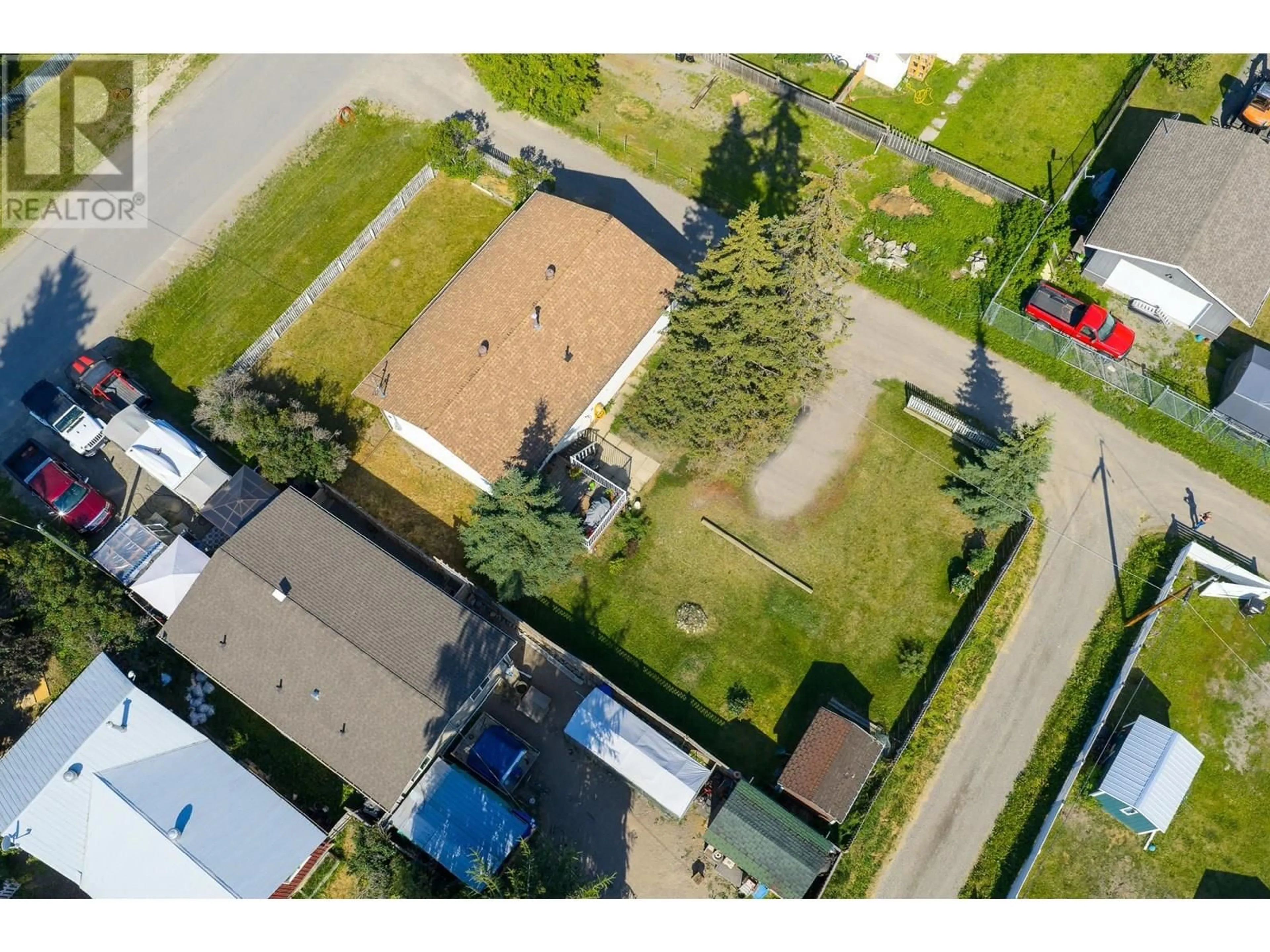 A pic from outside/outdoor area/front of a property/back of a property/a pic from drone, street for 218 3RD STREET, Vanderhoof British Columbia V0J3A0
