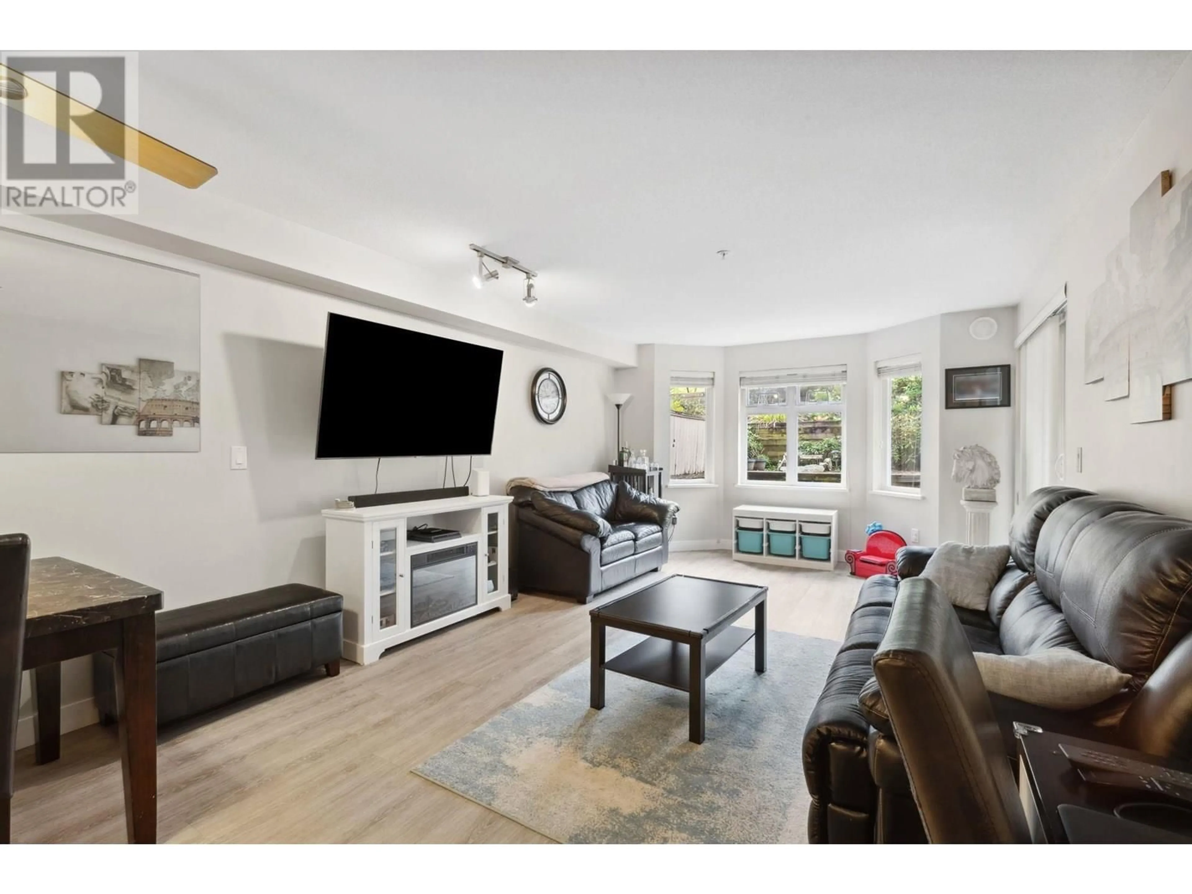 Living room with furniture, unknown for 310 - 160 SHORELINE CIRCLE, Port Moody British Columbia V3H0B2