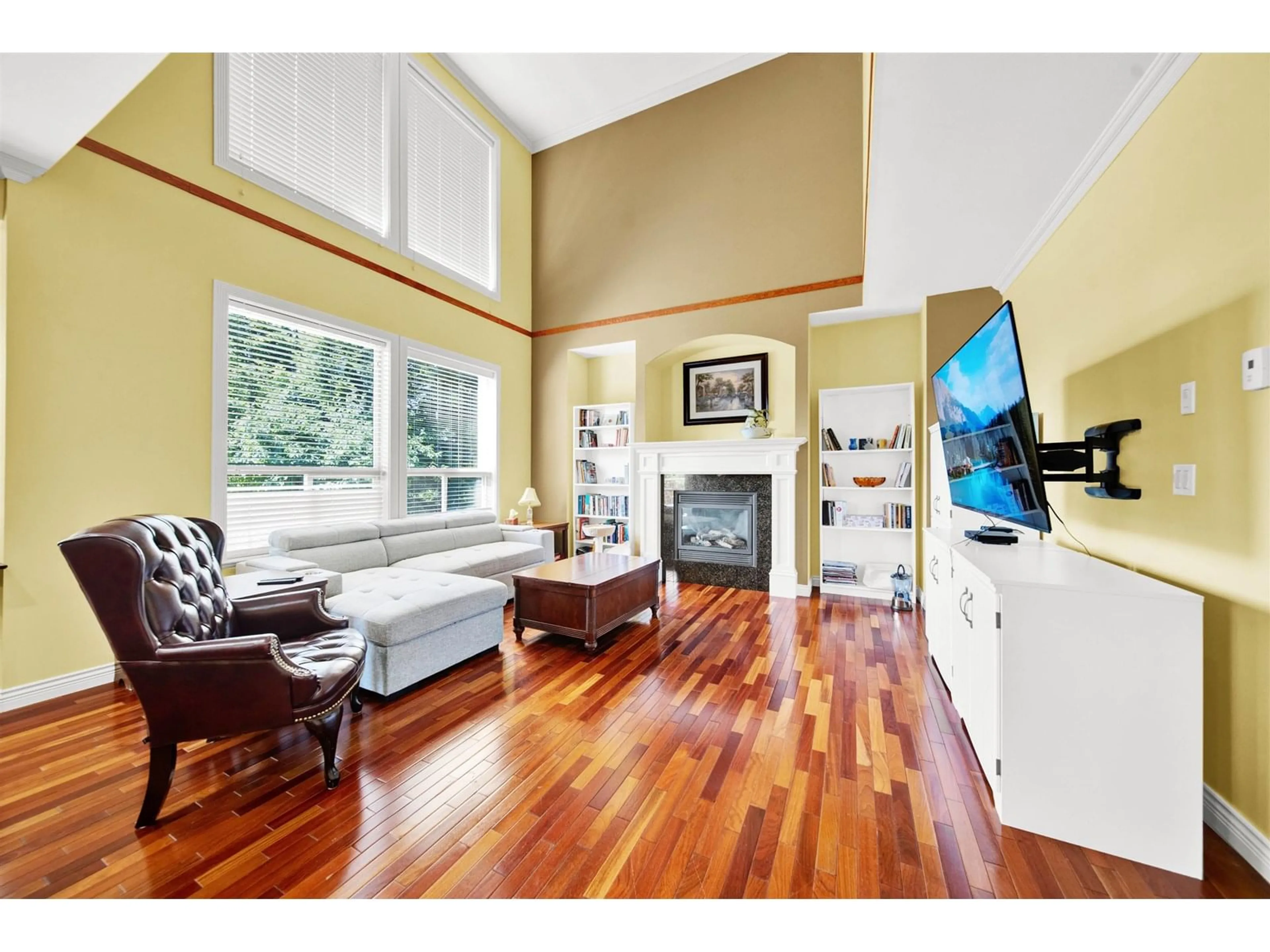 Living room with furniture, wood/laminate floor for 6081 164A, Surrey British Columbia V3S3V8
