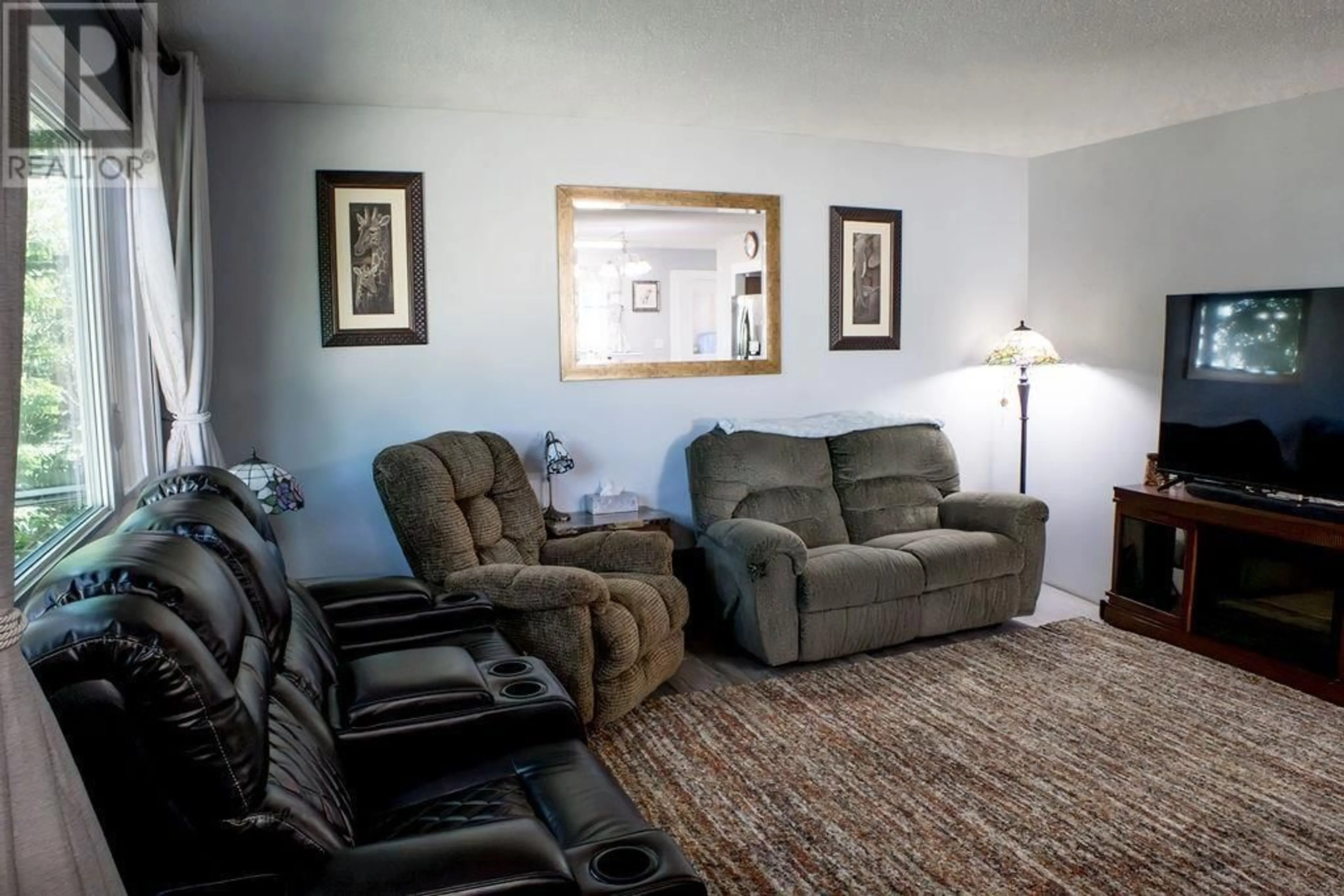 Living room with furniture, carpet floor for 8916 91ST STREET, Fort St. John British Columbia V1J4R6