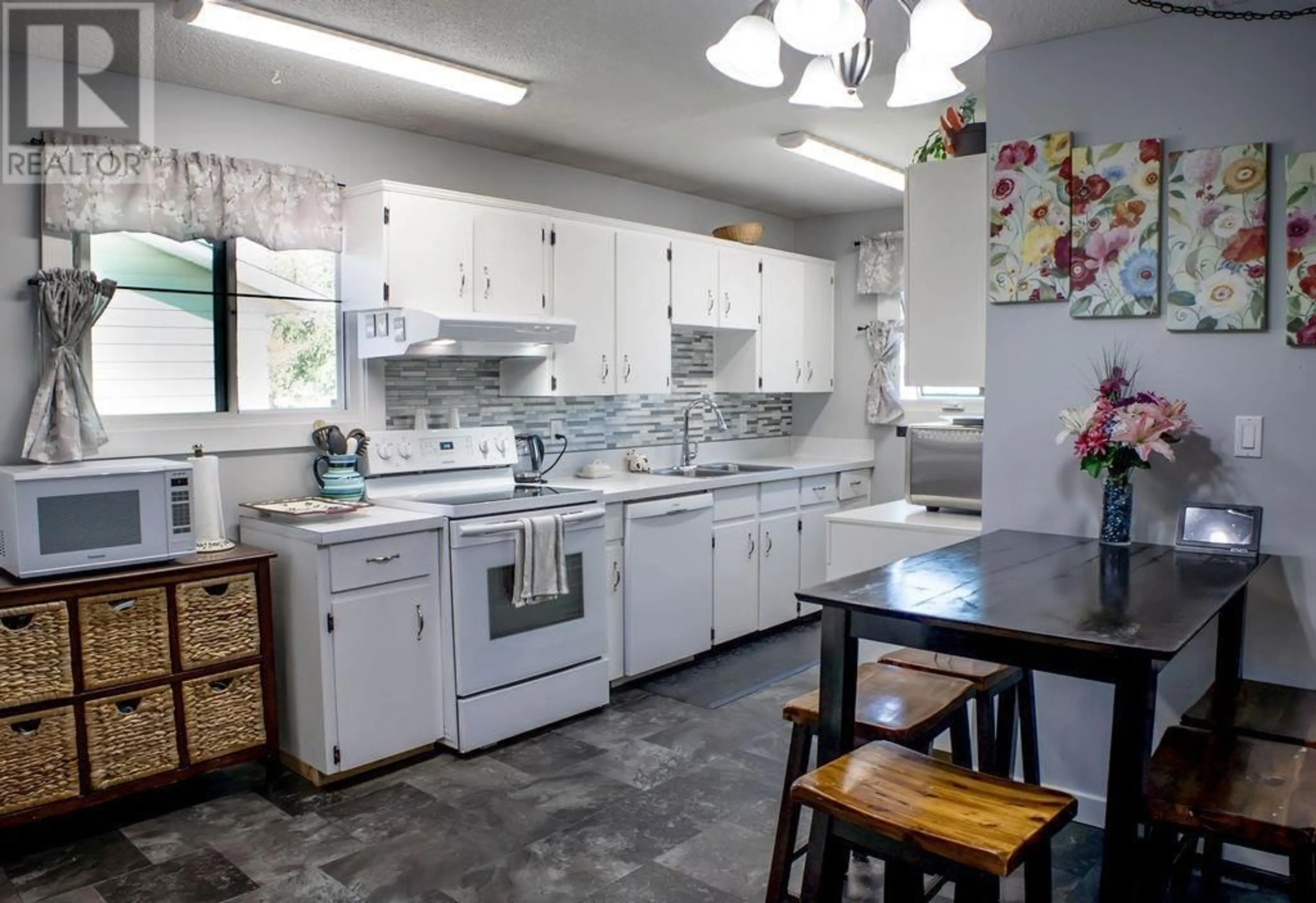 Standard kitchen, ceramic/tile floor for 8916 91ST STREET, Fort St. John British Columbia V1J4R6