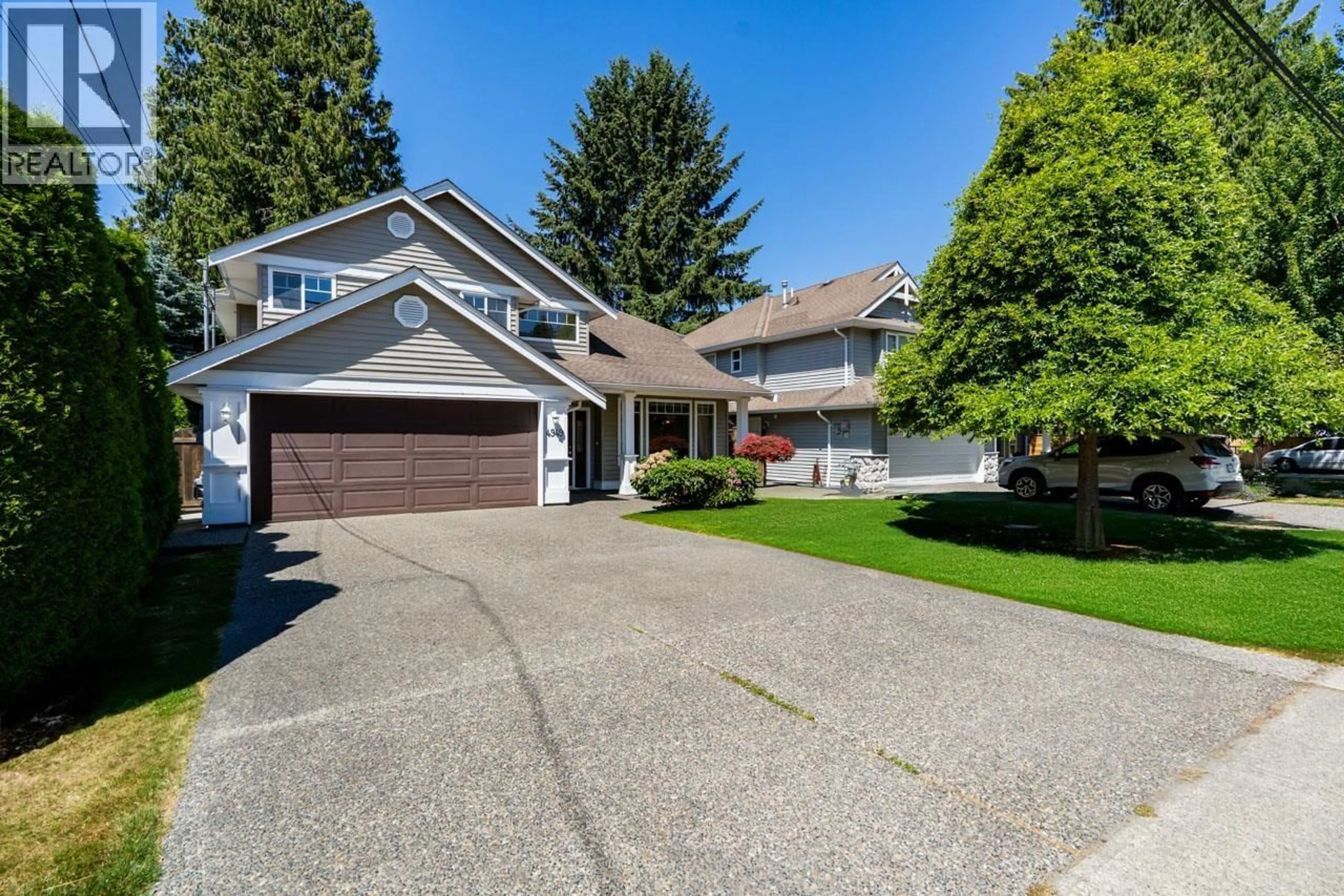 Home with vinyl exterior material, street for 4949 WESTMINSTER AVENUE, Ladner British Columbia V4K2J1