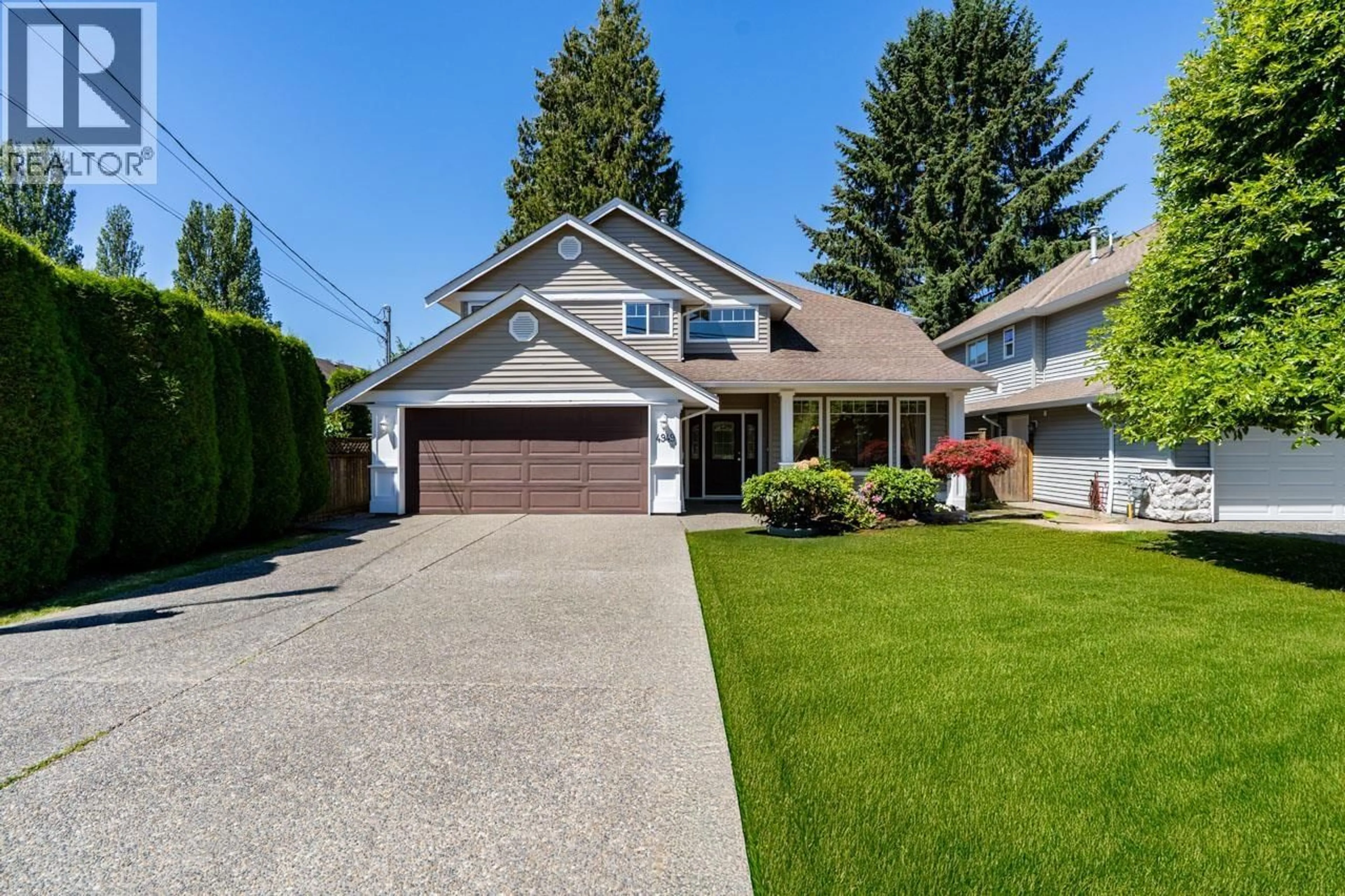 Home with vinyl exterior material, street for 4949 WESTMINSTER AVENUE, Ladner British Columbia V4K2J1