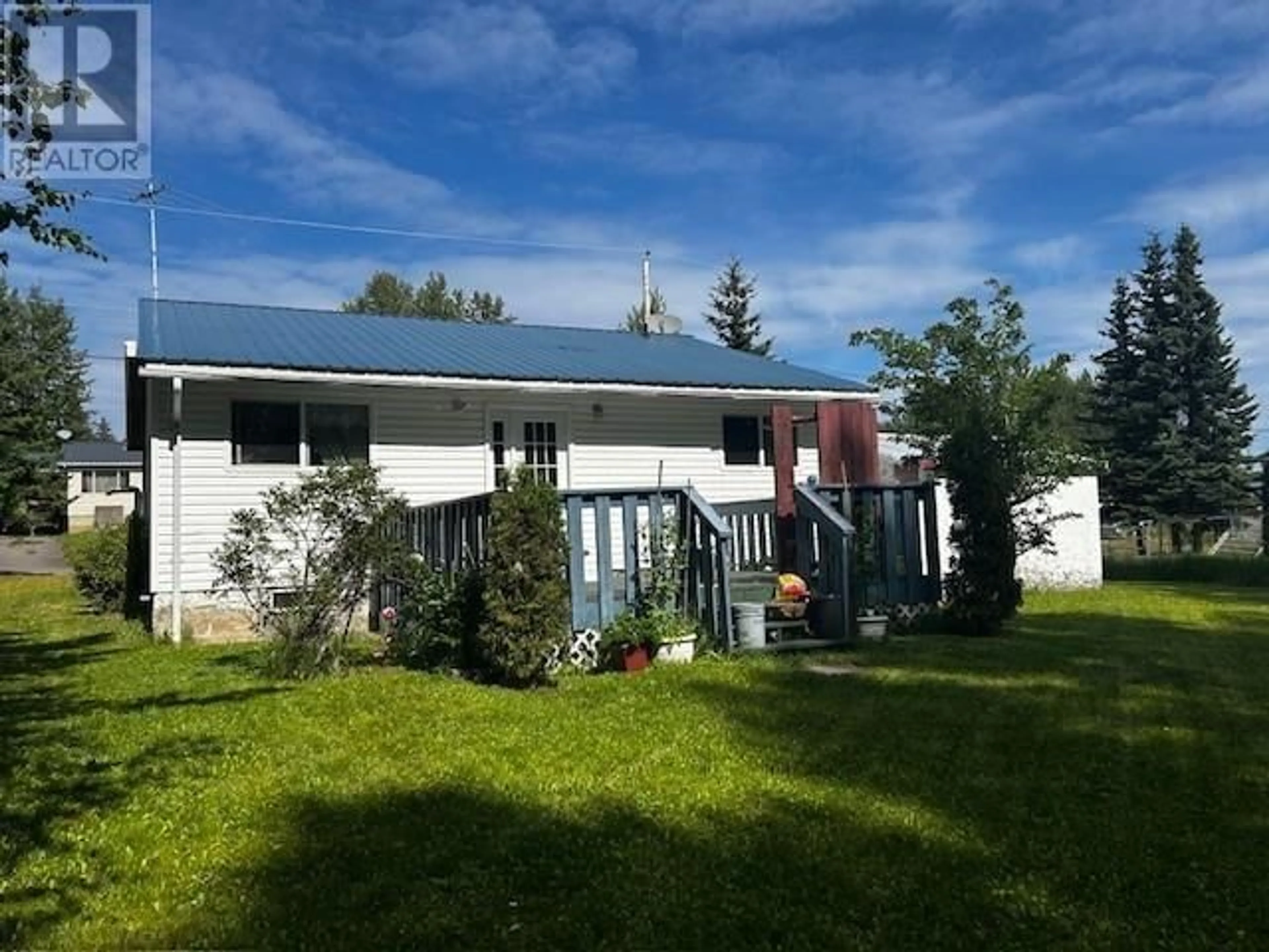 A pic from outside/outdoor area/front of a property/back of a property/a pic from drone, unknown for 63 MORRISON STREET, Granisle British Columbia V0J1W0