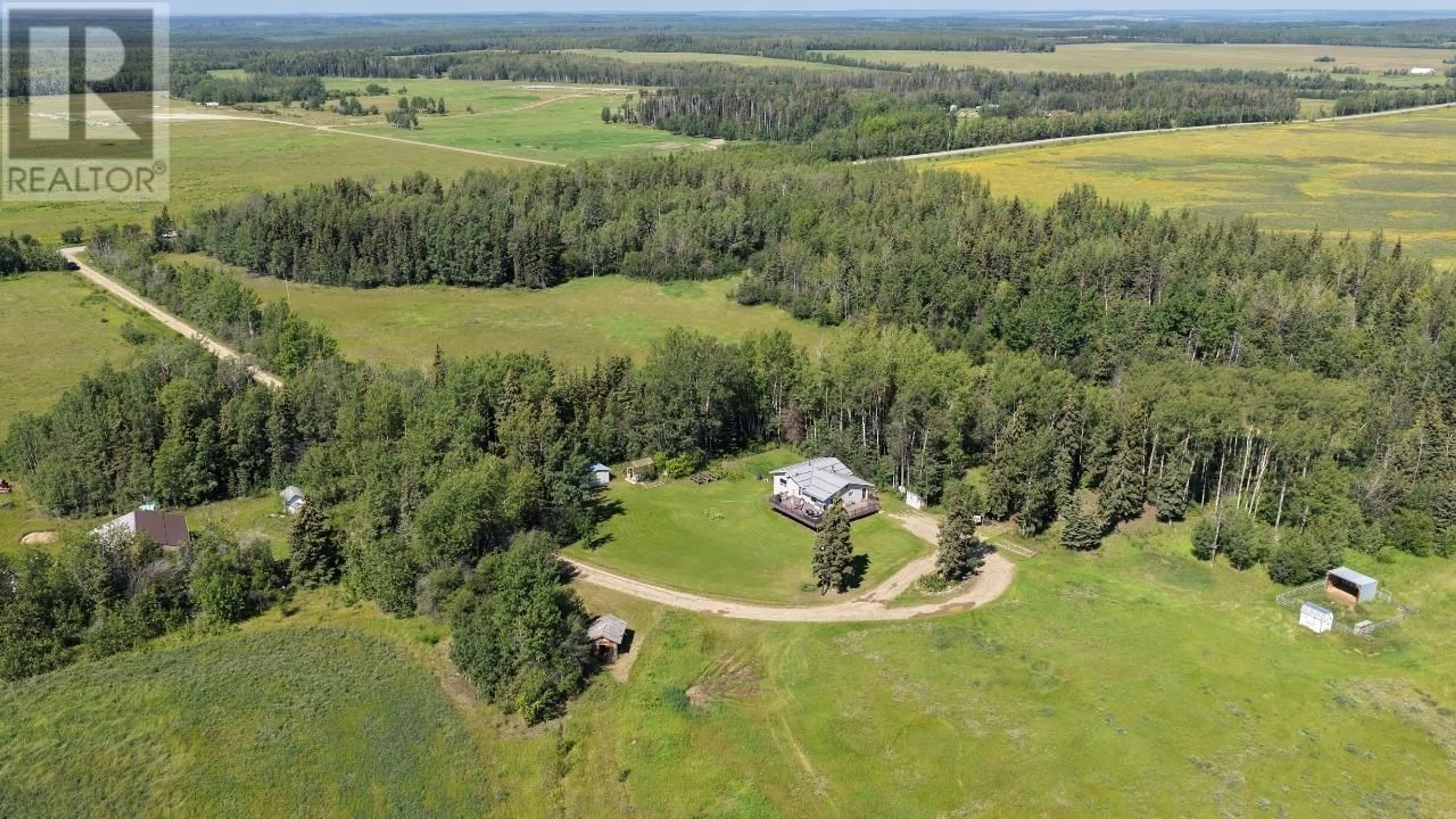 A pic from outside/outdoor area/front of a property/back of a property/a pic from drone, forest/trees view for 17266 PRESPATOU ROAD, Fort St. John British Columbia V0C1Y0