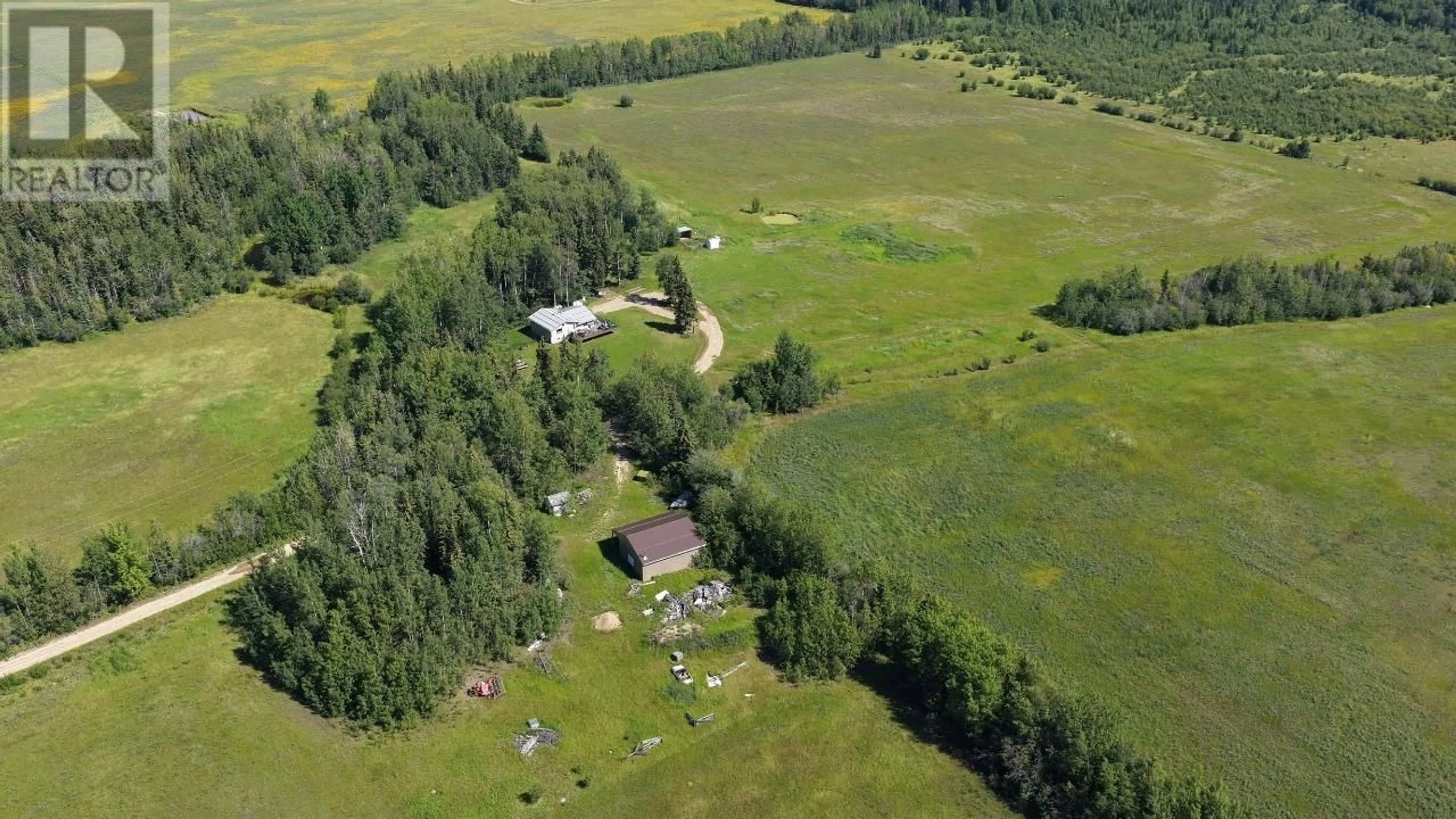 A pic from outside/outdoor area/front of a property/back of a property/a pic from drone, unknown for 17266 PRESPATOU ROAD, Fort St. John British Columbia V0C1Y0