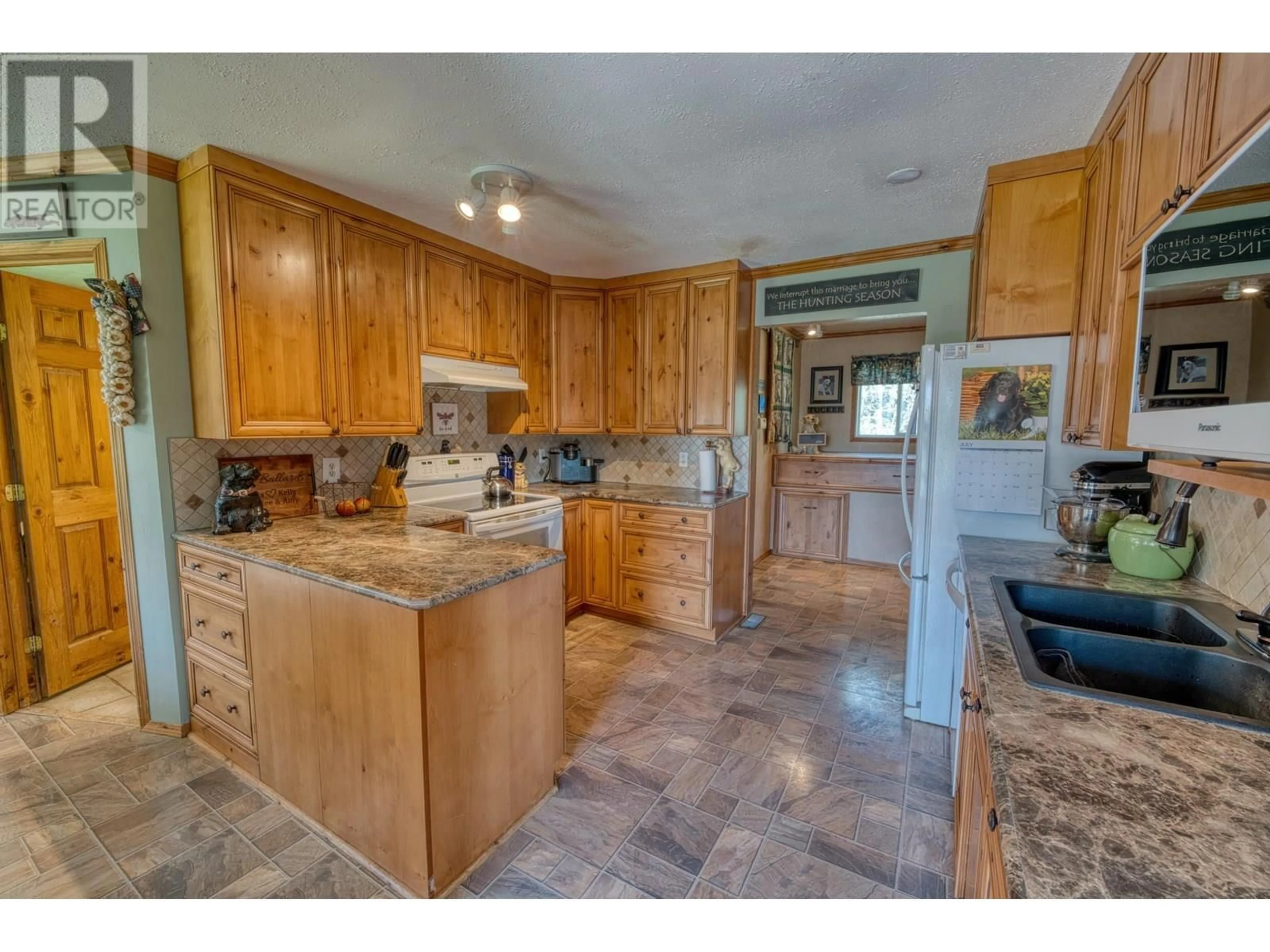 Open concept kitchen, ceramic/tile floor for 17266 PRESPATOU ROAD, Fort St. John British Columbia V0C1Y0