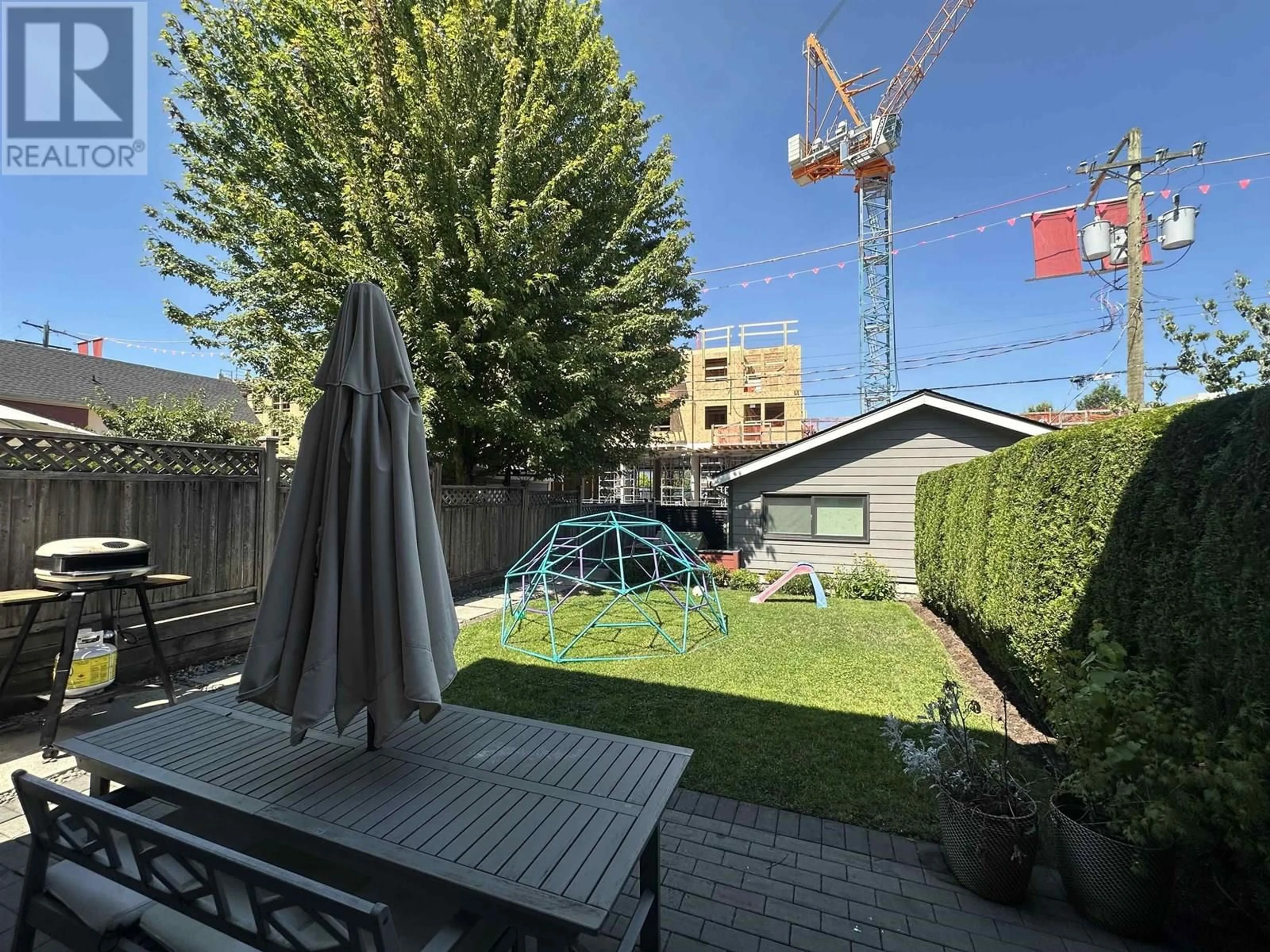 A pic from outside/outdoor area/front of a property/back of a property/a pic from drone, street for 2073 PENDER STREET, Vancouver British Columbia V5L1X1