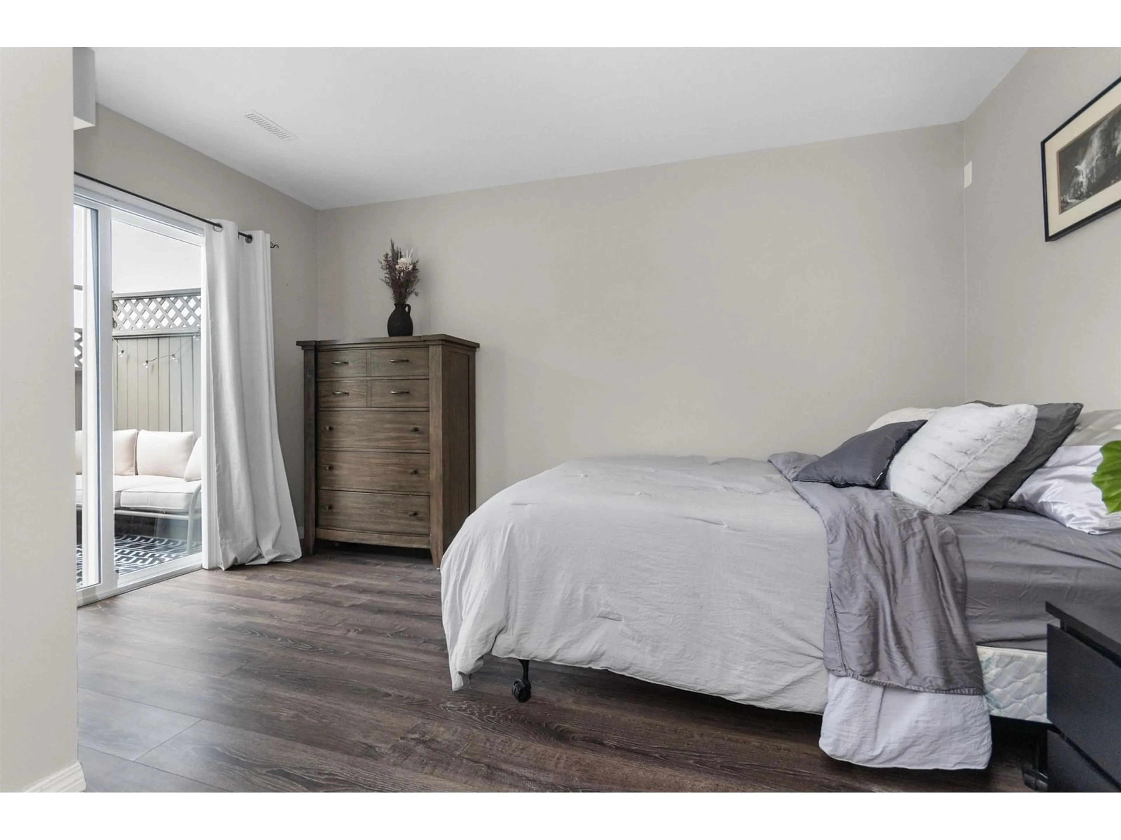 Bedroom with bed, wood/laminate floor for 1602 - 5260 GOLDSPRING PLACE, Chilliwack British Columbia V2R5S5