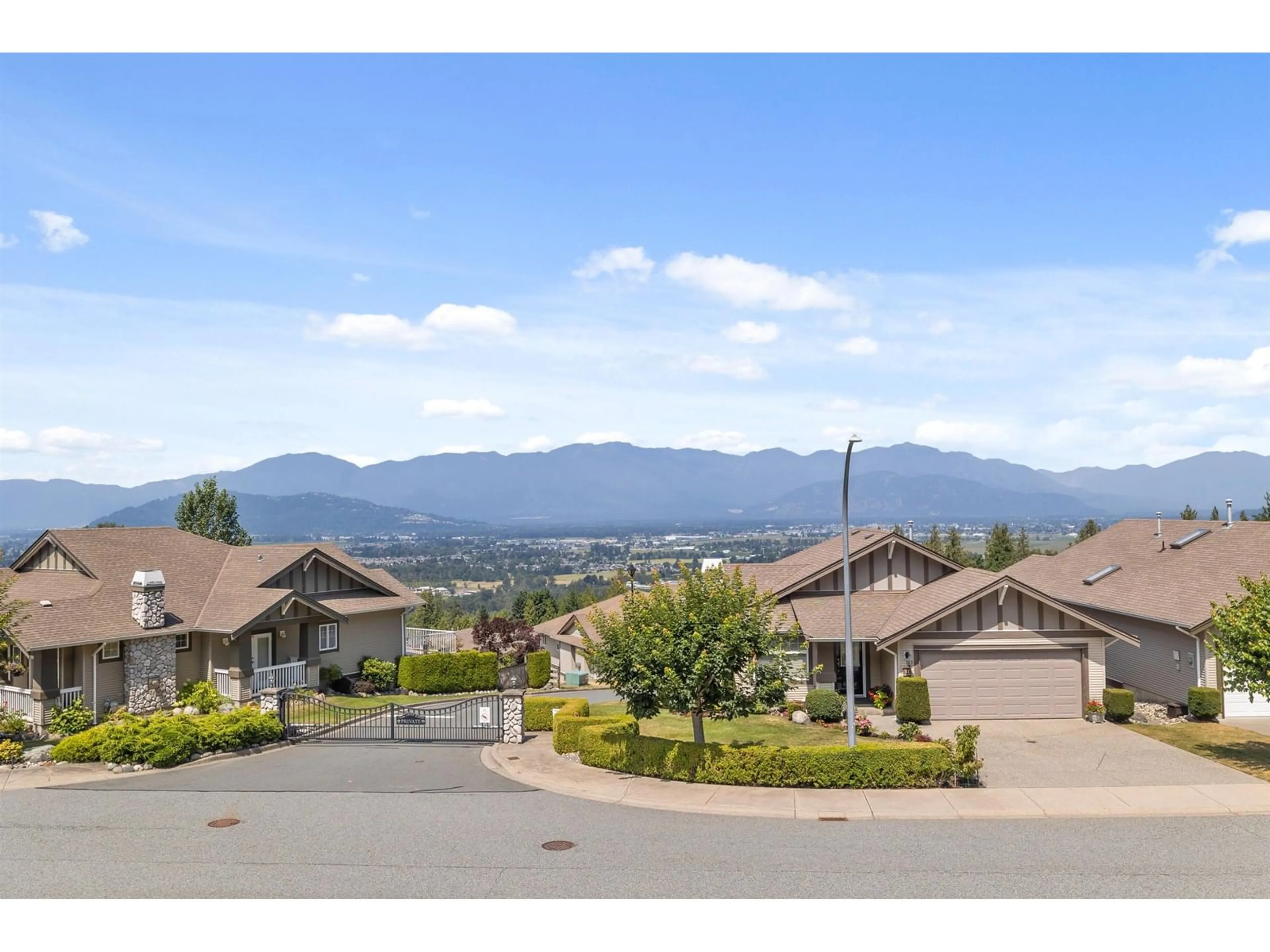 A pic from outside/outdoor area/front of a property/back of a property/a pic from drone, mountain view for 47088 SYLVAN DRIVE, Chilliwack British Columbia V2R0P3