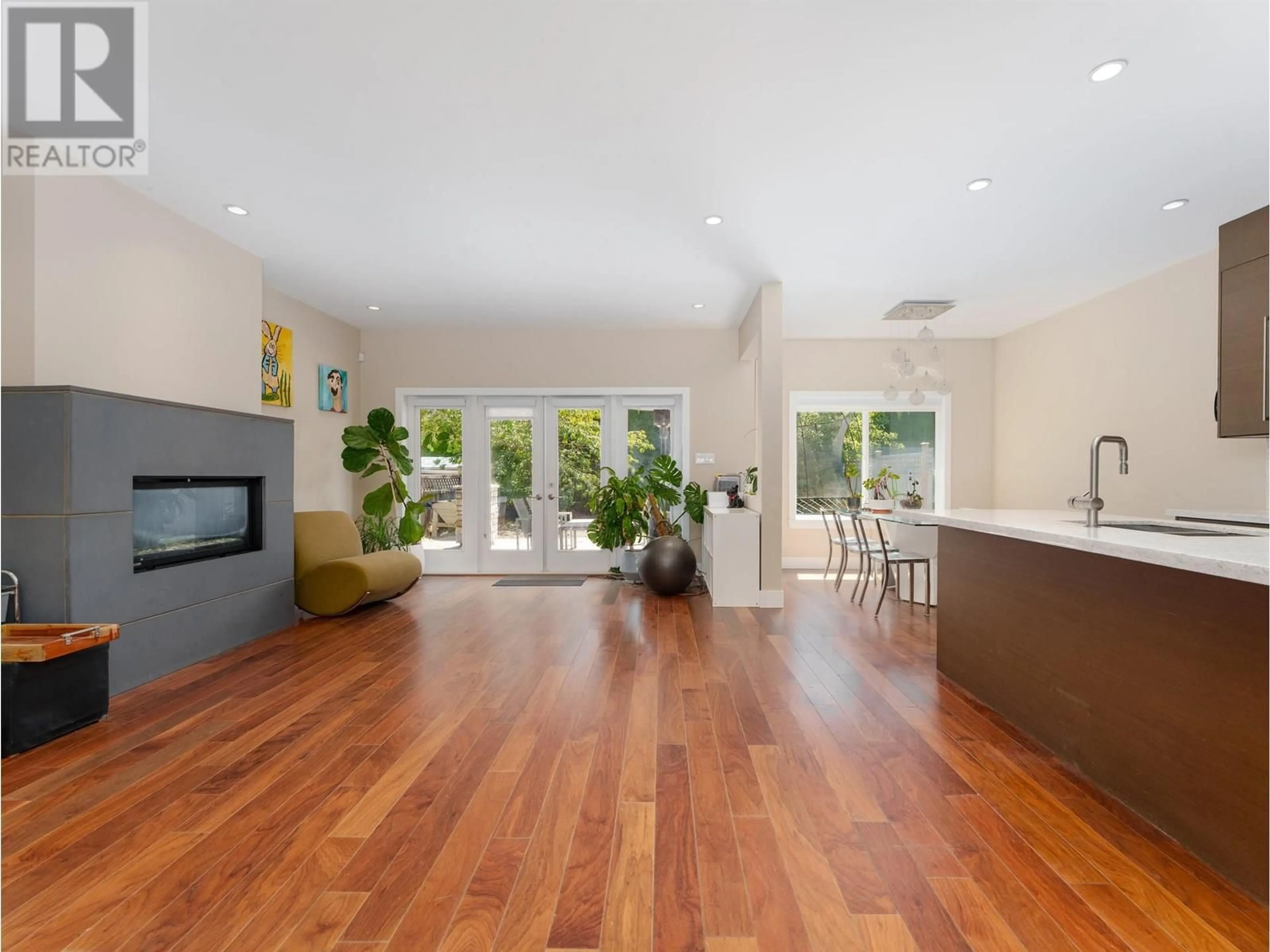 Open concept kitchen, wood/laminate floor for 3660 GEORGIA STREET, Richmond British Columbia V7E2S1