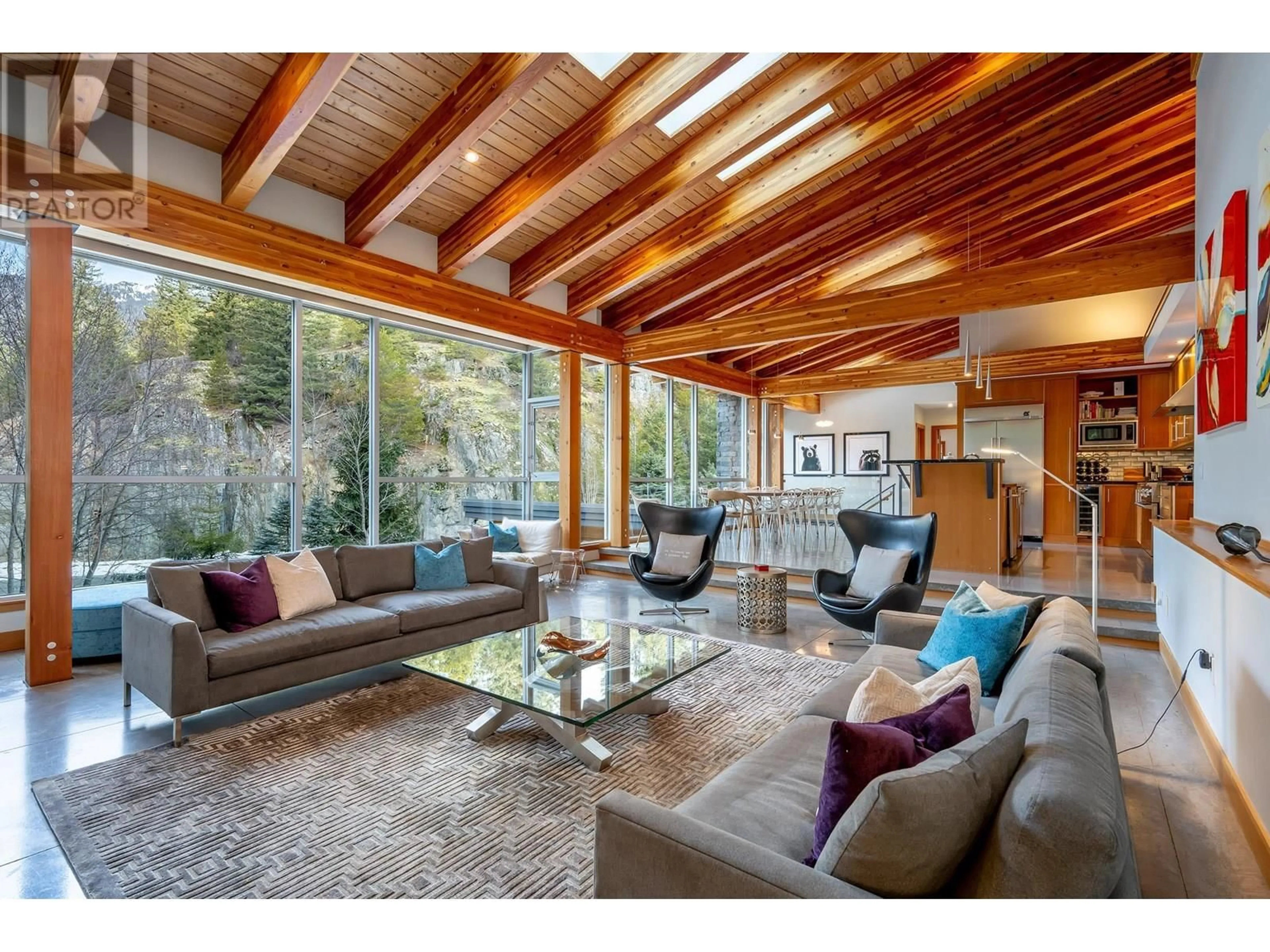 Living room with furniture, wood/laminate floor for 1530 SPRING CREEK DRIVE, Whistler British Columbia V8E0A2