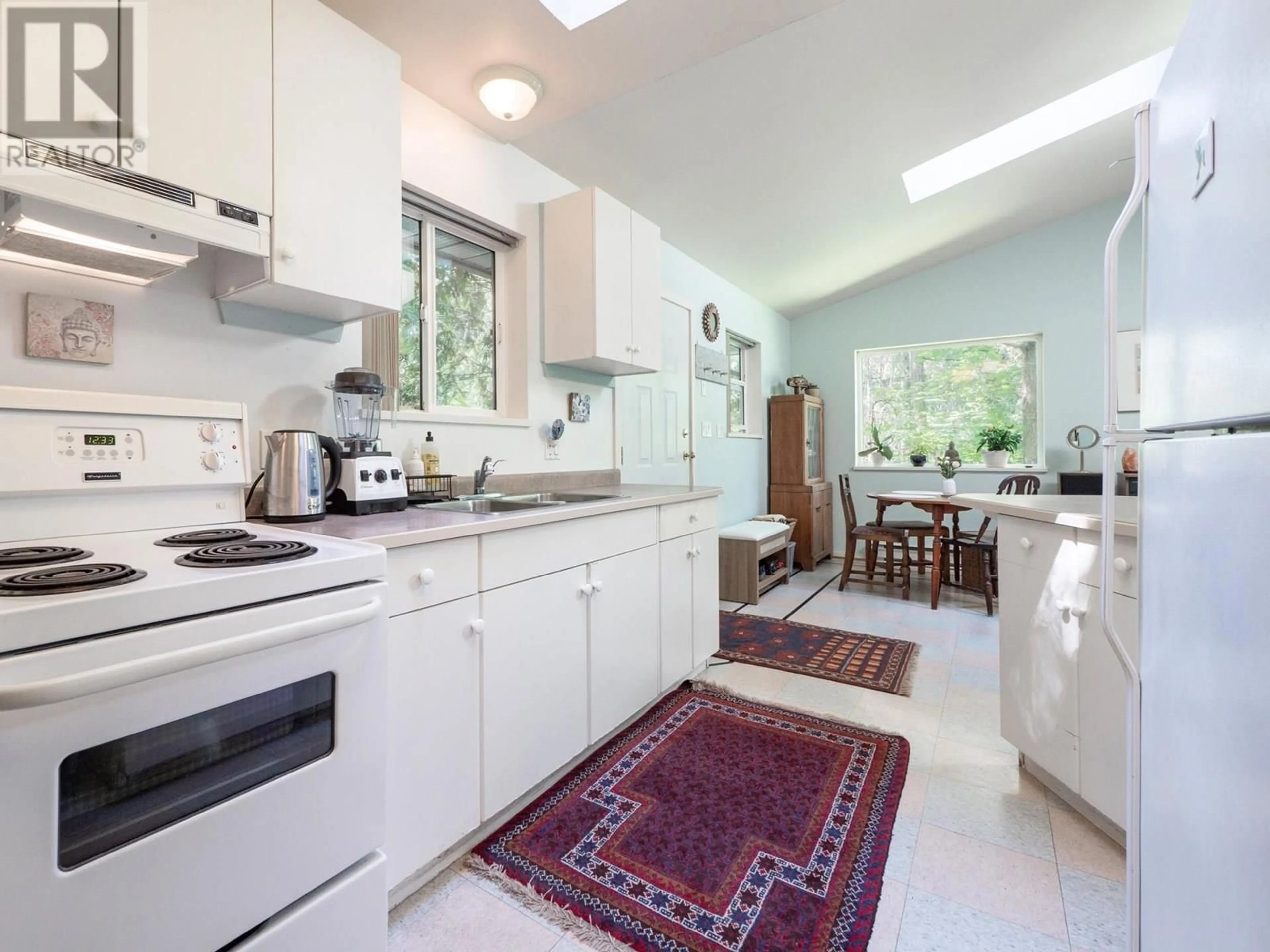 Standard kitchen, ceramic/tile floor for 7027 SKANA CRESCENT, Sechelt British Columbia V7Z0C8