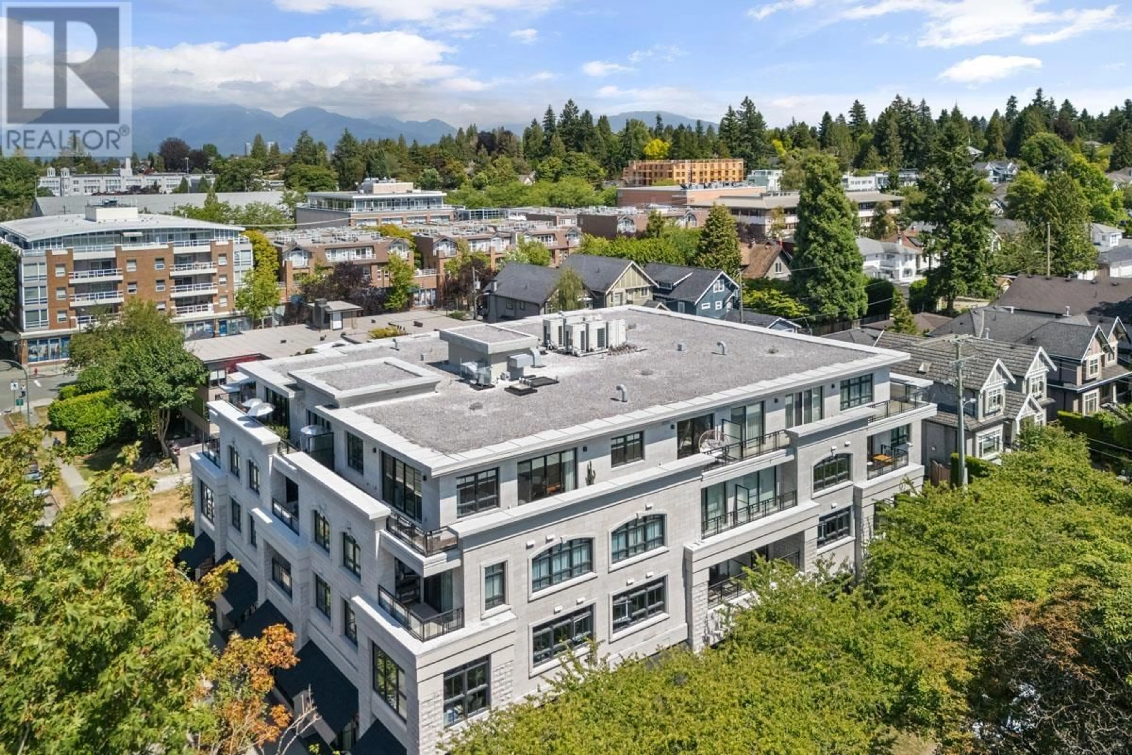 A pic from outside/outdoor area/front of a property/back of a property/a pic from drone, mountain view for PH4 - 2089 43RD AVENUE, Vancouver British Columbia V6M2C8