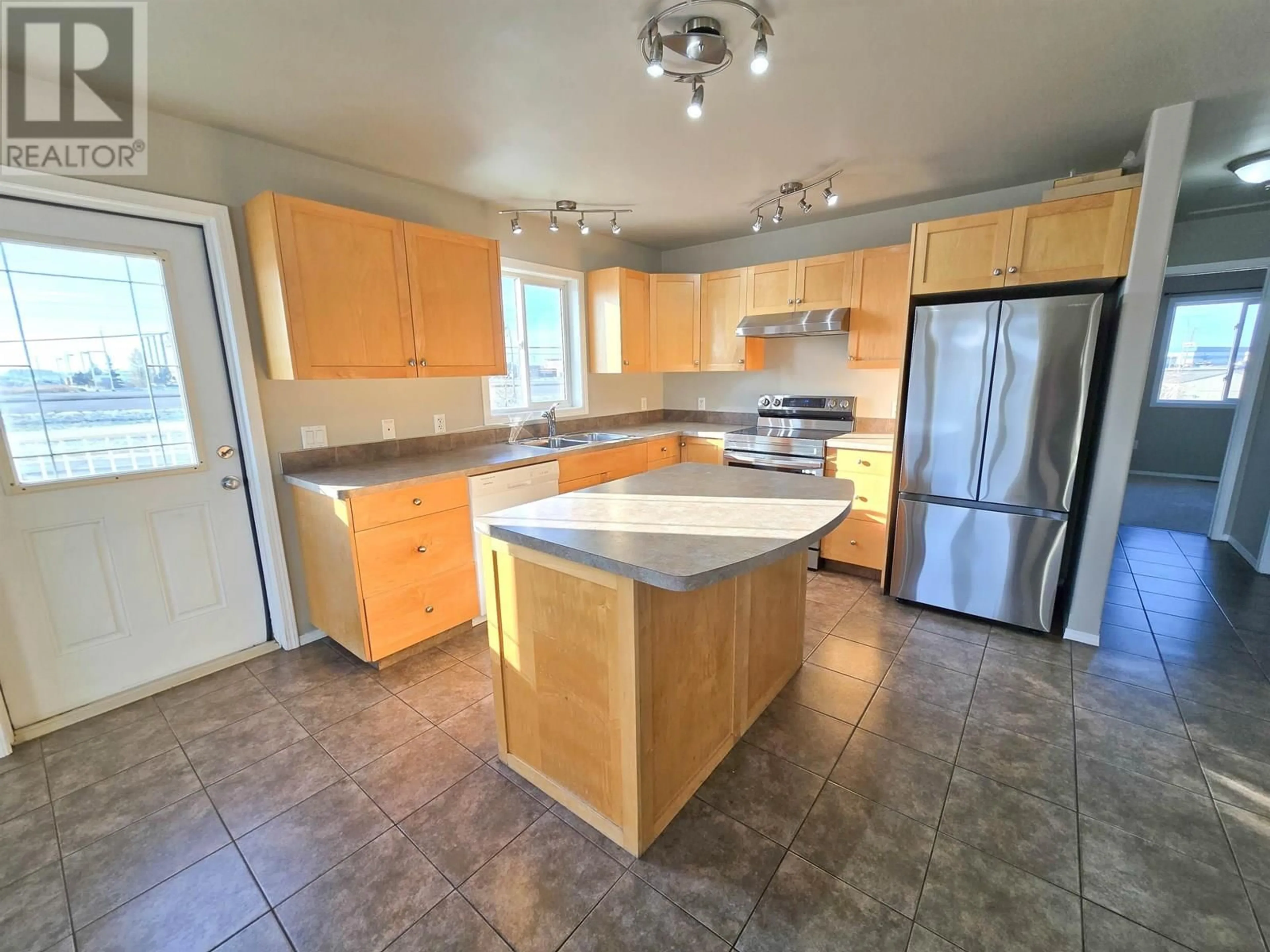 Open concept kitchen, unknown for 8516 91 STREET, Fort St. John British Columbia V1J7H5