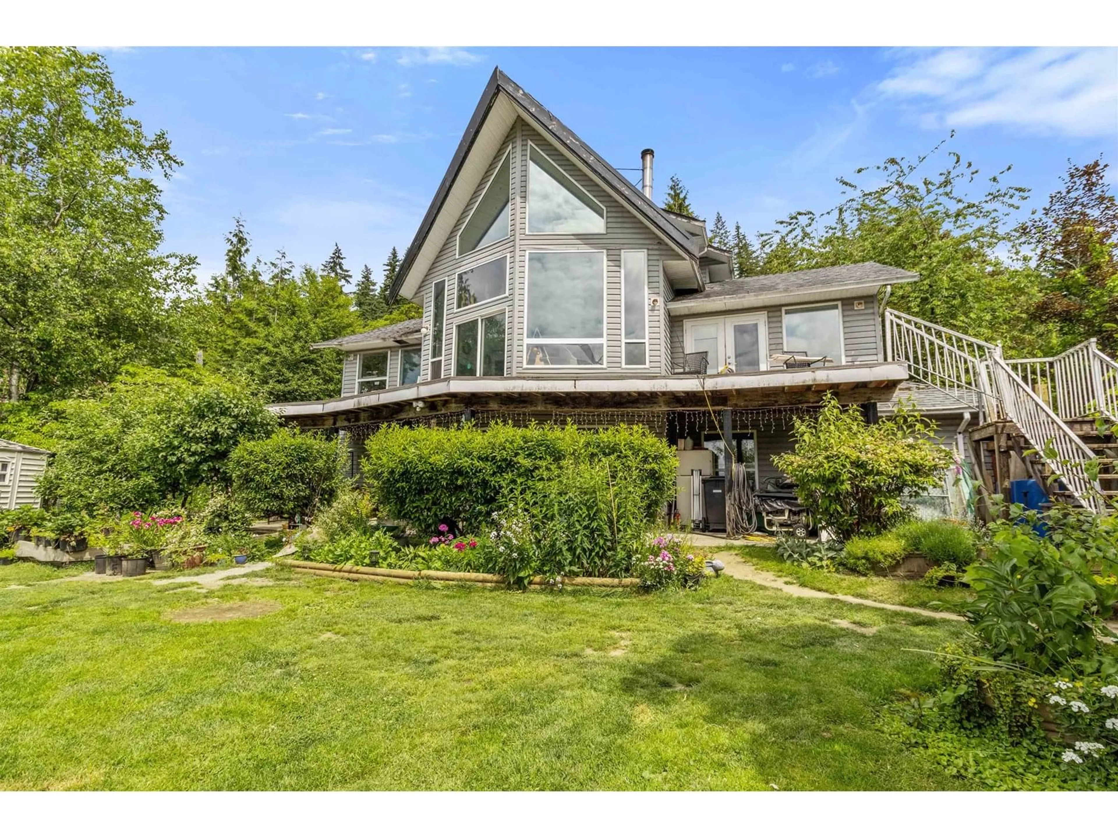 A pic from outside/outdoor area/front of a property/back of a property/a pic from drone, water/lake/river/ocean view for 11060 GREENWOOD, Mission British Columbia V4S1A9