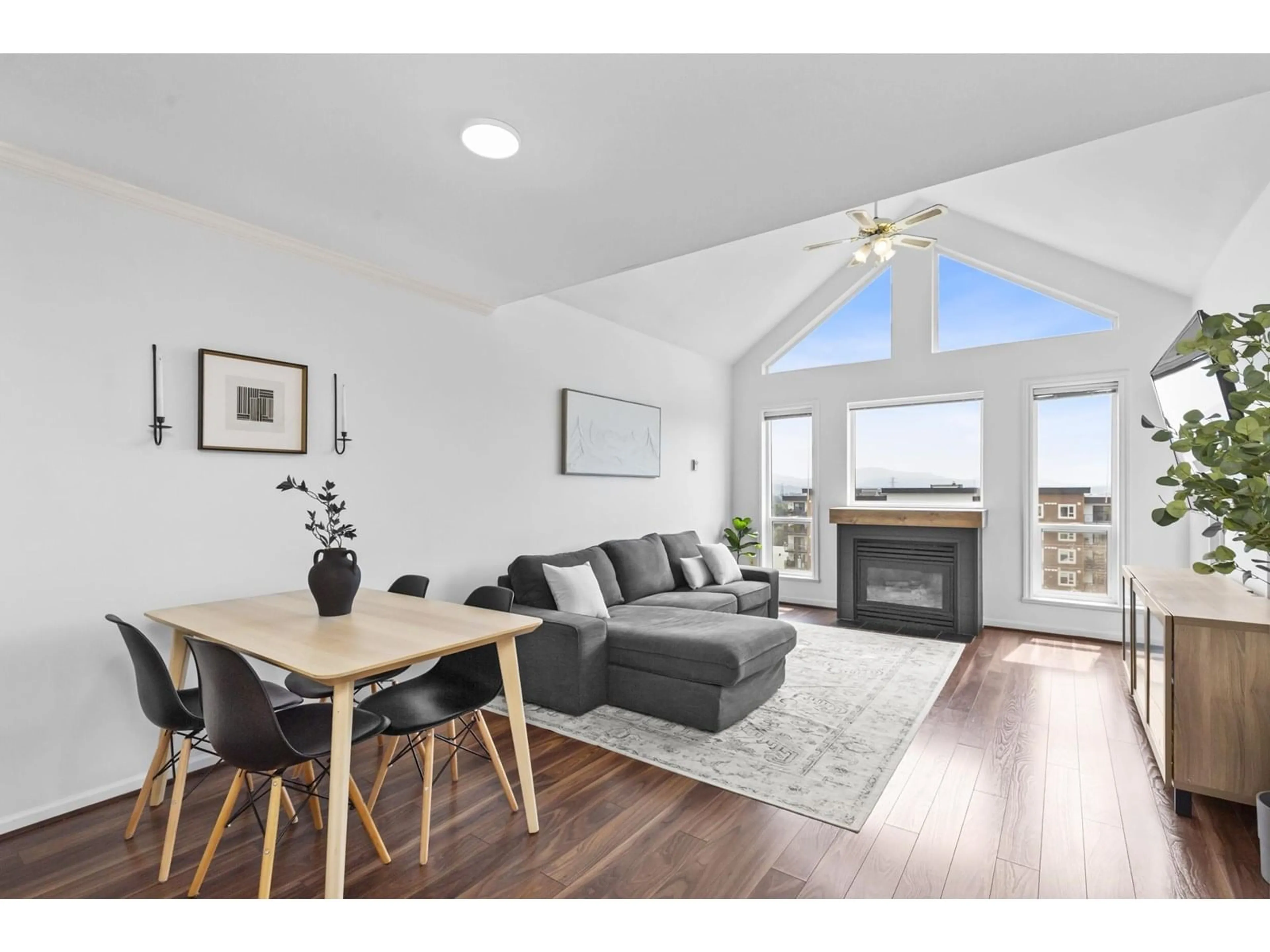 Living room with furniture, wood/laminate floor for 311 - 33150 4, Mission British Columbia V2V7A3