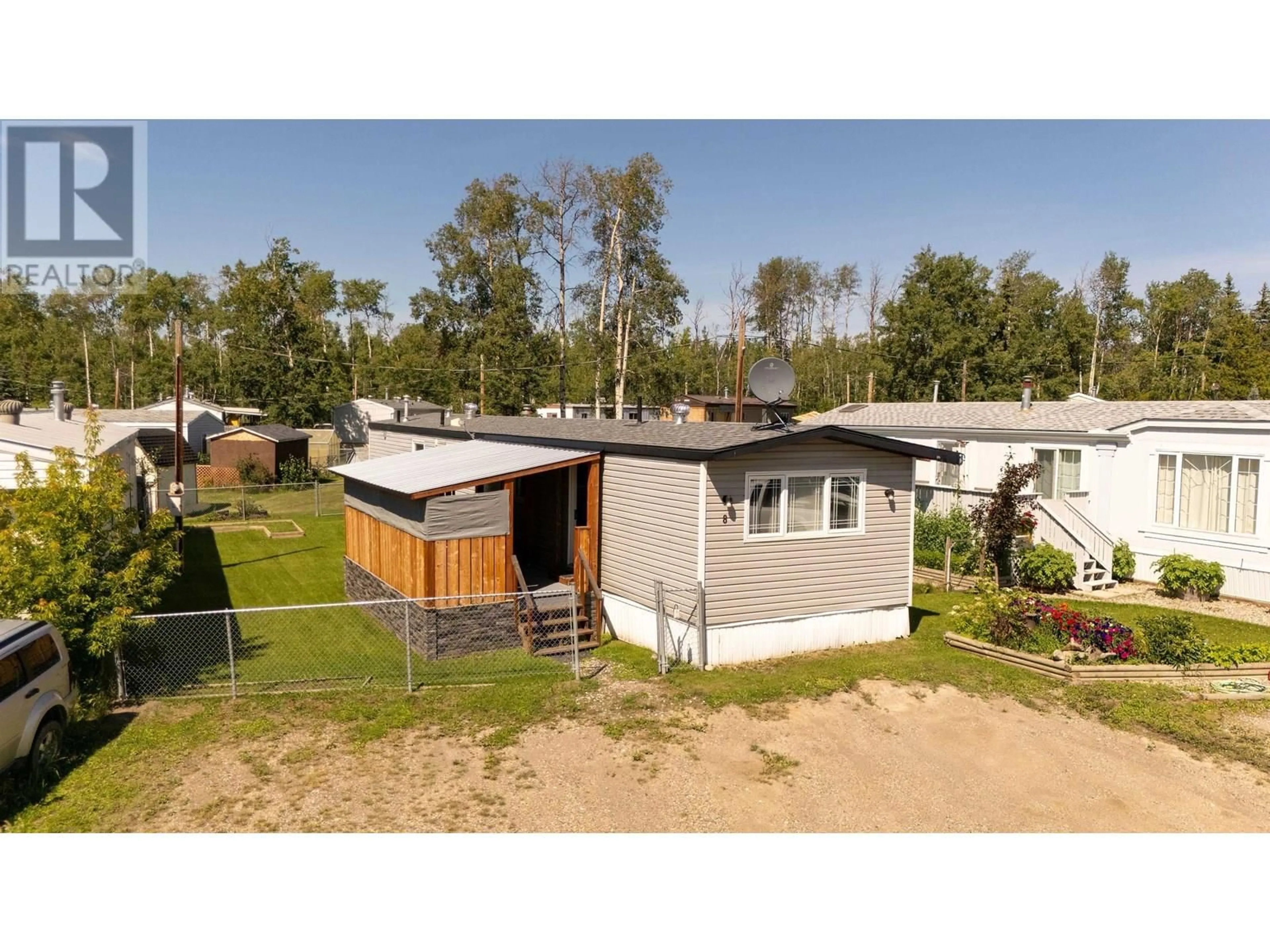 A pic from outside/outdoor area/front of a property/back of a property/a pic from drone, street for 8 - 7414 FOREST LAWN STREET, Fort St. John British Columbia V1J8B7