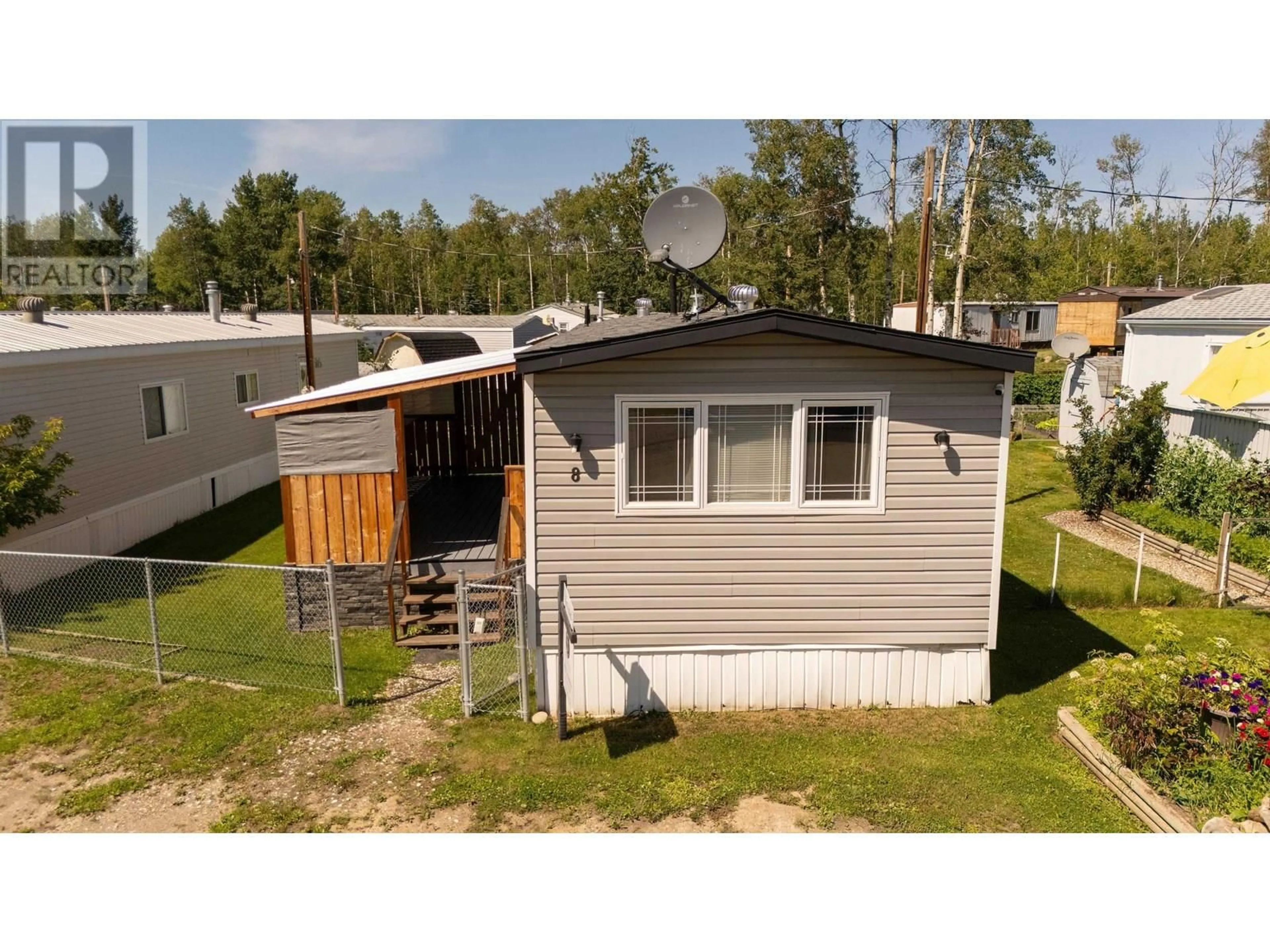 A pic from outside/outdoor area/front of a property/back of a property/a pic from drone, street for 8 - 7414 FOREST LAWN STREET, Fort St. John British Columbia V1J8B7