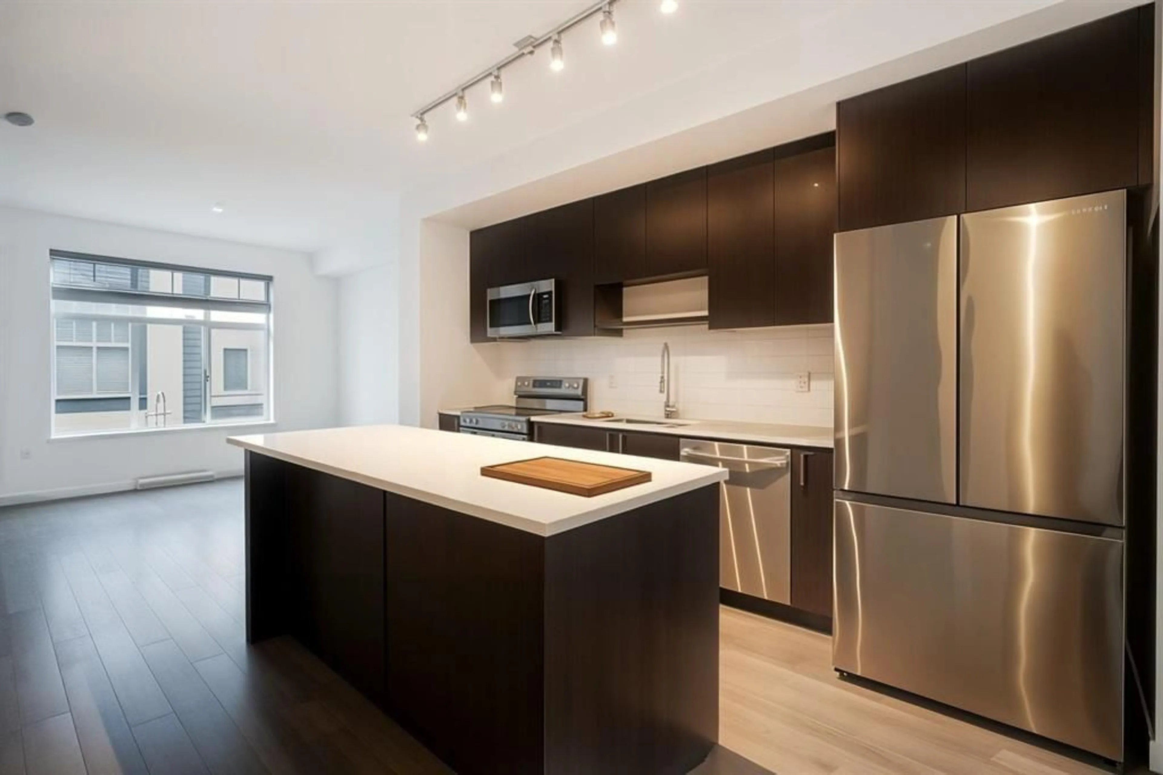 Open concept kitchen, wood/laminate floor for 95 - 15778 85 AVENUE, Surrey British Columbia V4N6W8