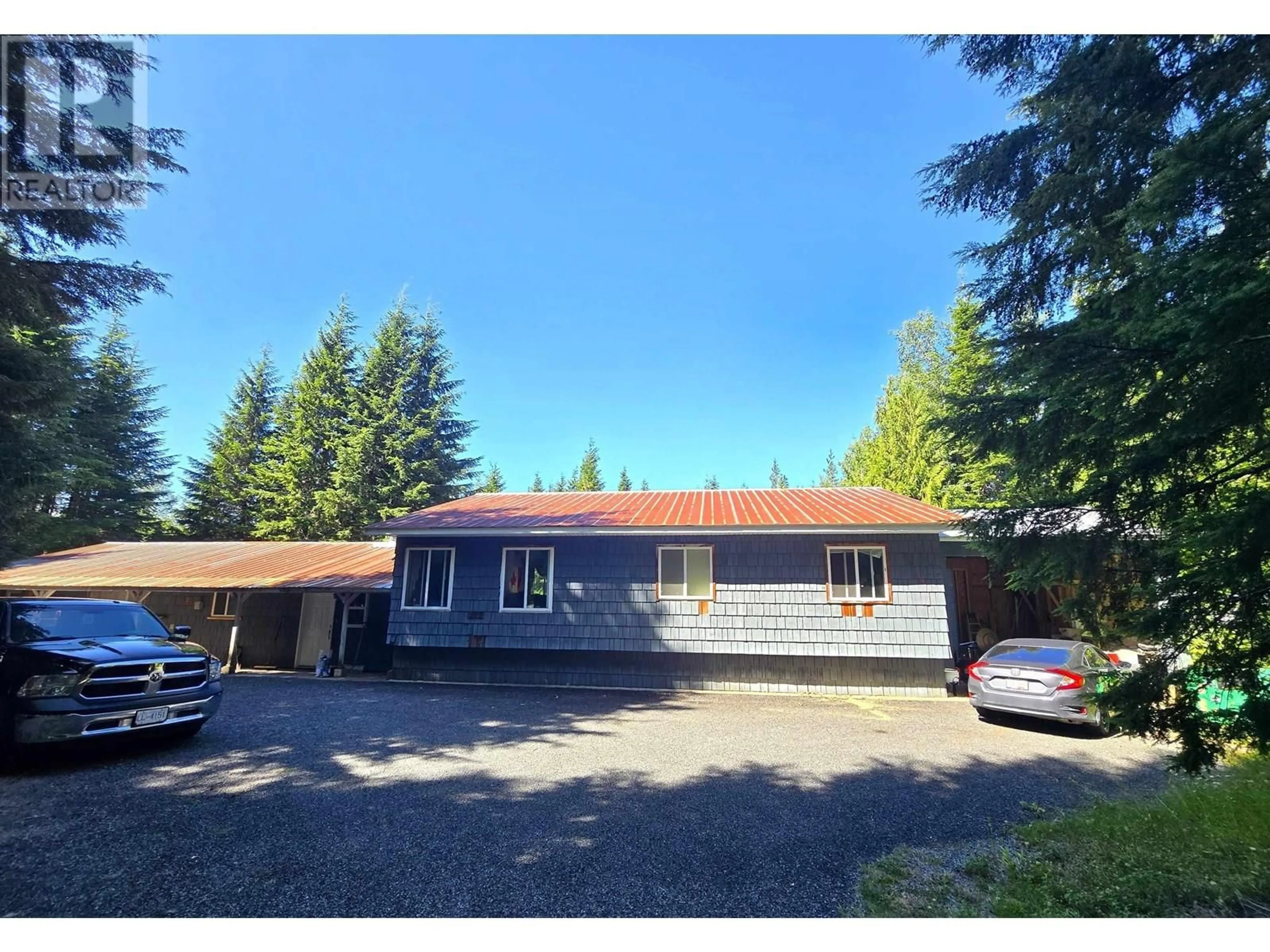 A pic from outside/outdoor area/front of a property/back of a property/a pic from drone, street for 205 OLD LAKELSE LAKE DRIVE, Terrace British Columbia V8G0G5