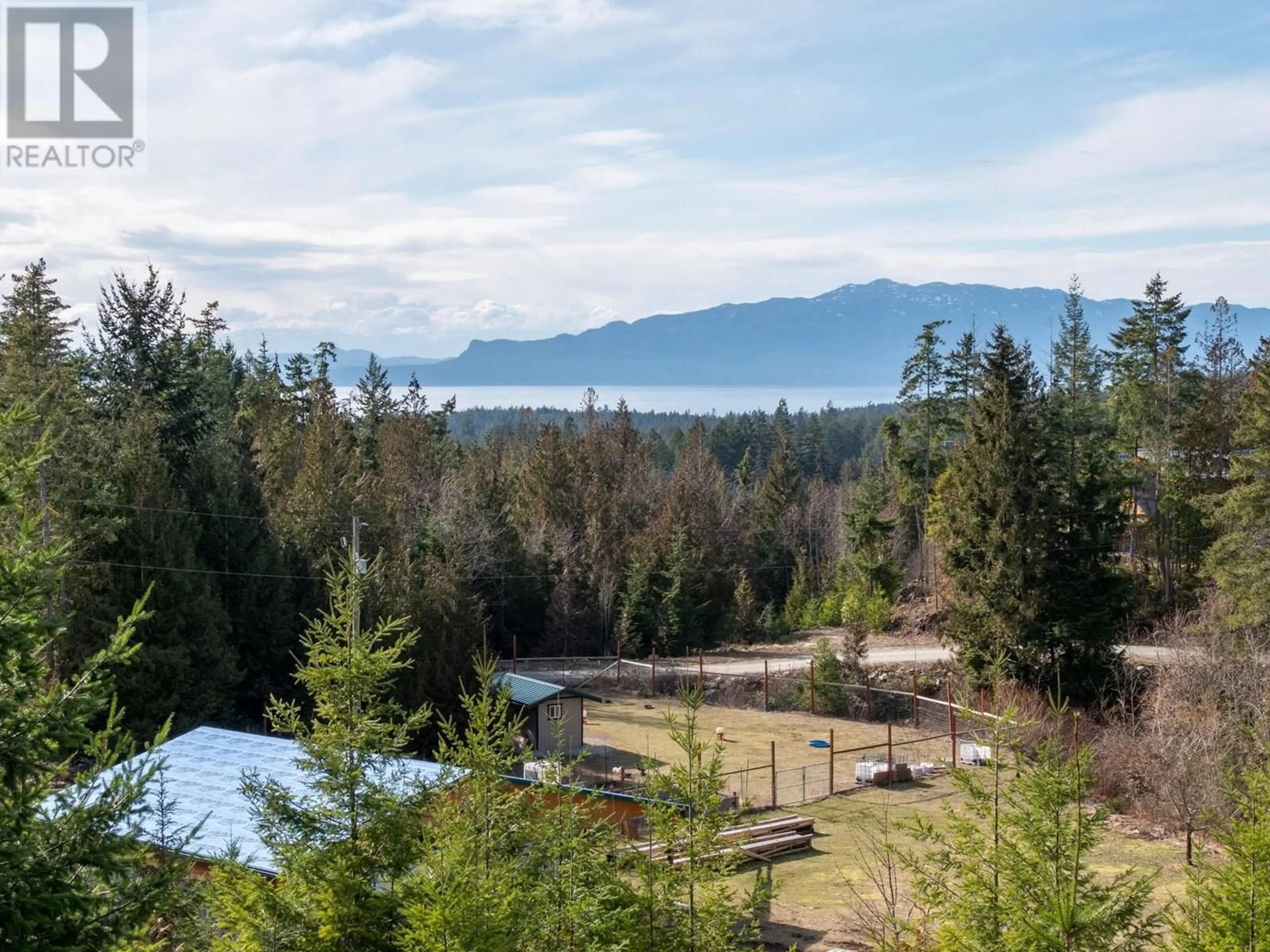A pic from outside/outdoor area/front of a property/back of a property/a pic from drone, water/lake/river/ocean view for 9305 STEPHENS WAY, Halfmoon Bay British Columbia V7Z1G9