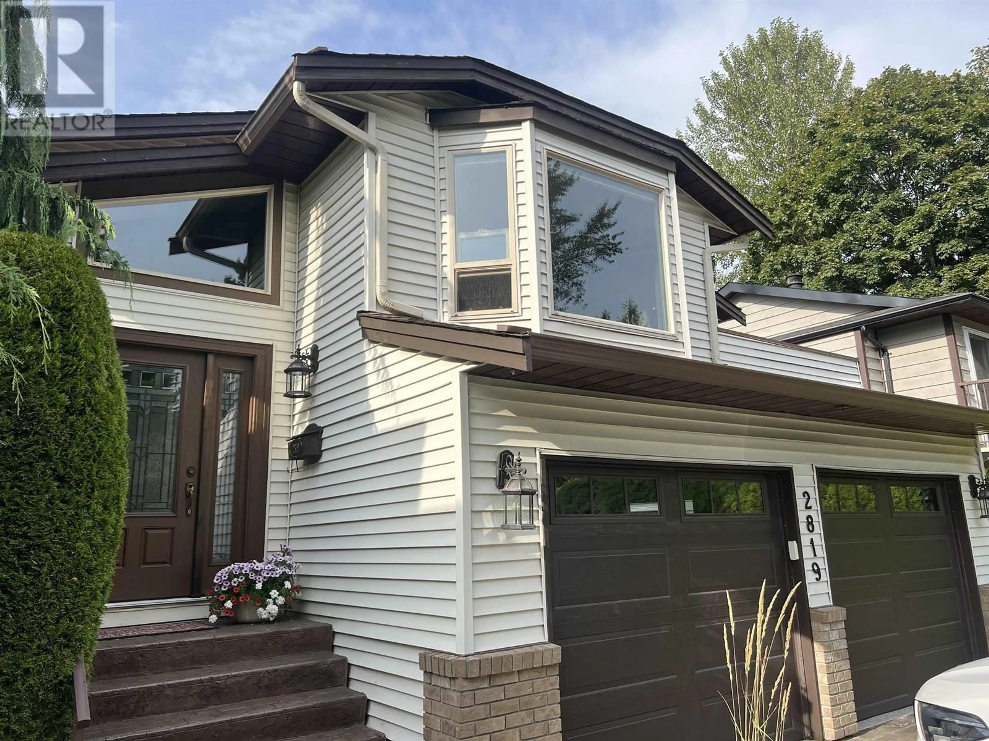 Home with vinyl exterior material, street for 2819 MCCOOMB DRIVE, Coquitlam British Columbia V3B6L2