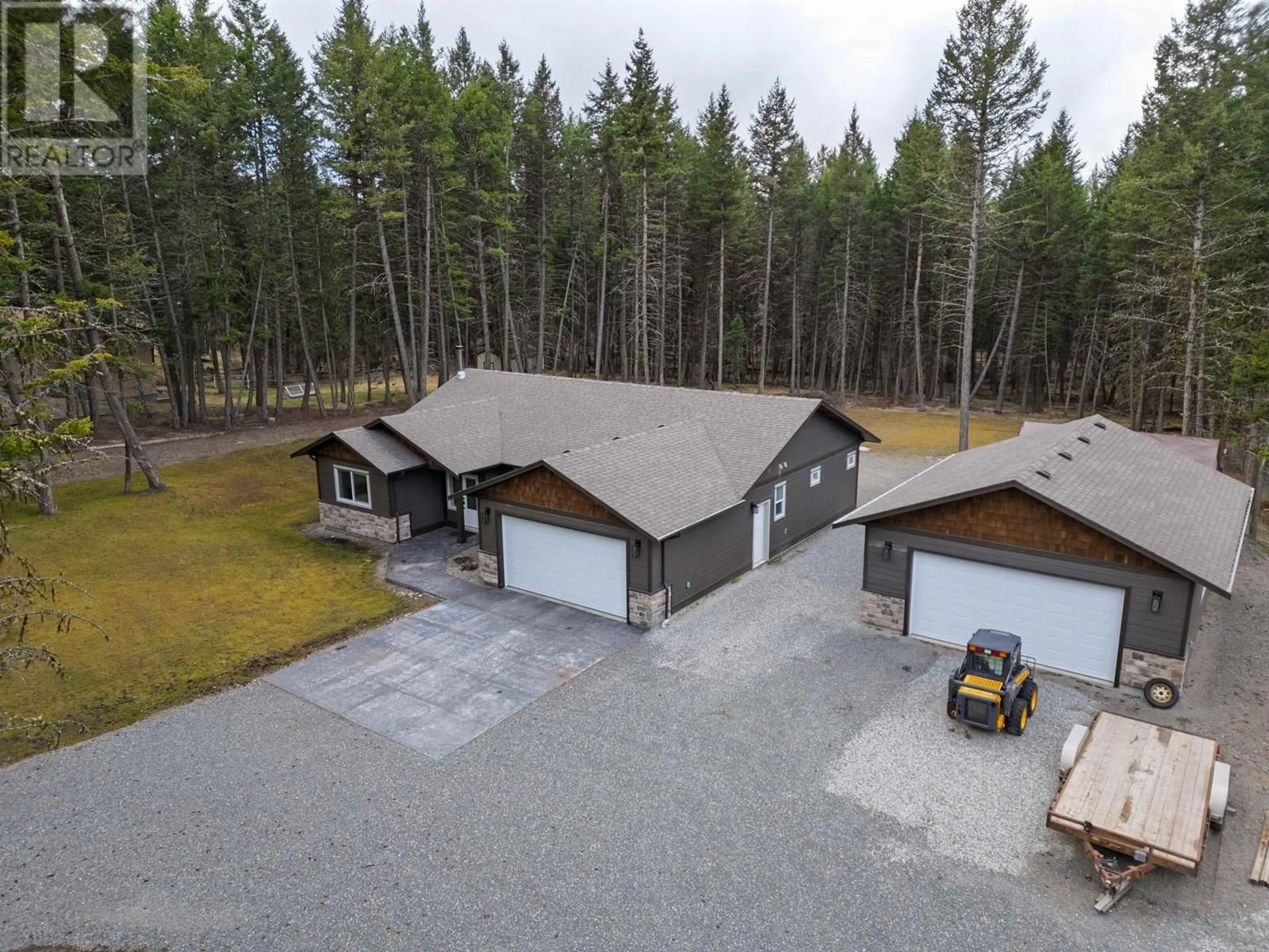A pic from outside/outdoor area/front of a property/back of a property/a pic from drone, unknown for 4962 MONICAL ROAD, 108 Mile Ranch British Columbia V0K2Z0